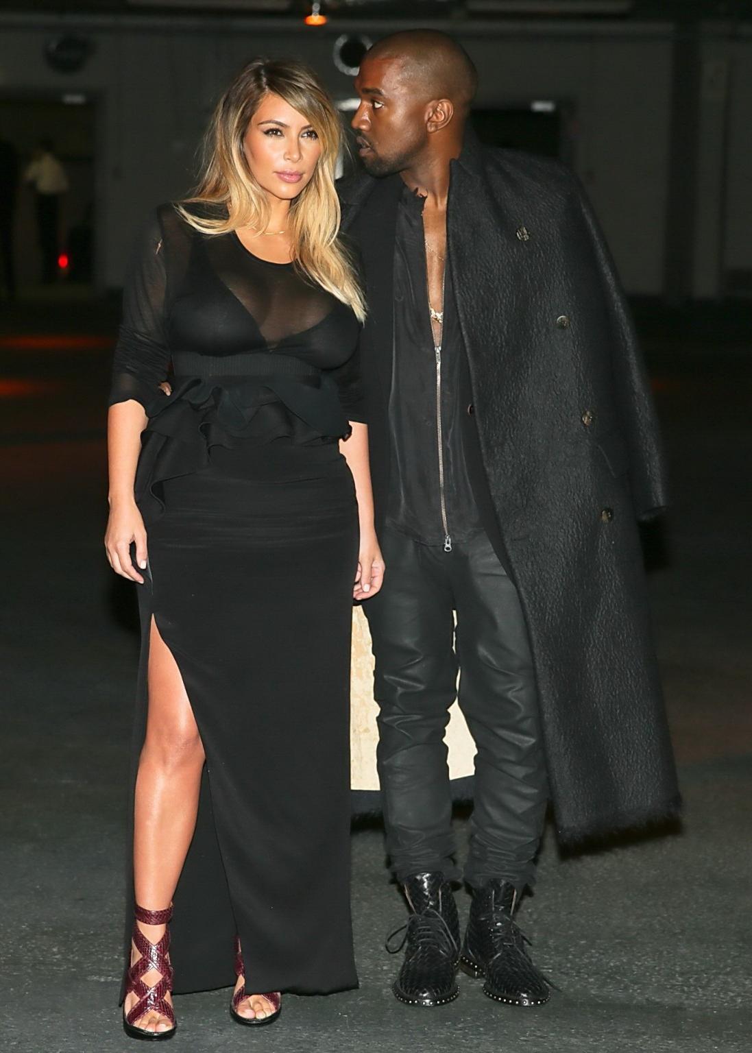 16P Kim Kardashian caught see-through to bra while leaving Givenchy Fashion Show in 