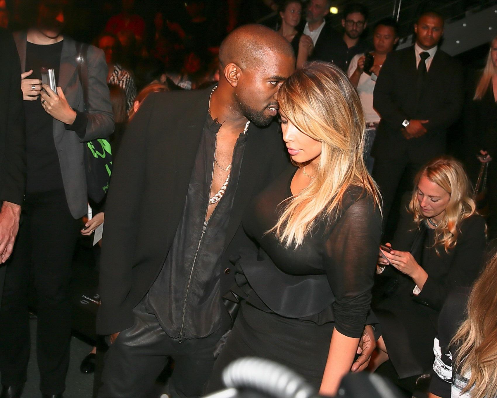16P Kim Kardashian caught see-through to bra while leaving Givenchy Fashion Show in 
