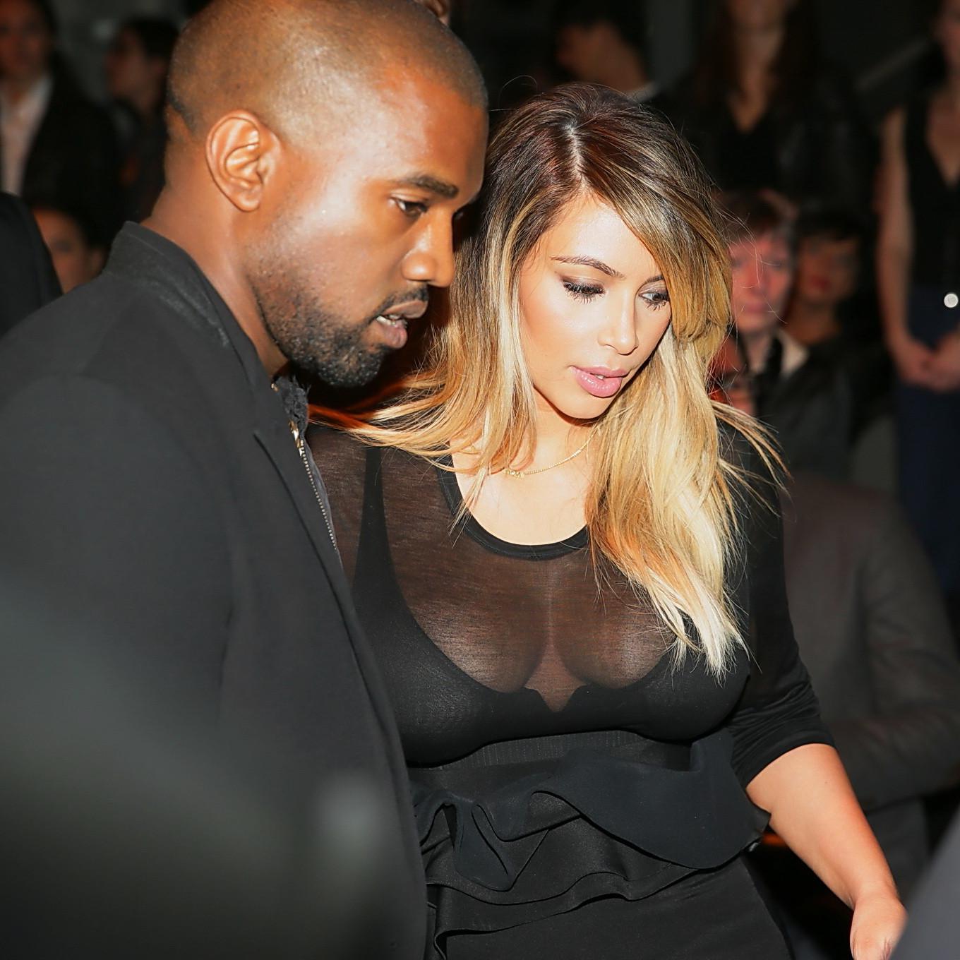 16P Kim Kardashian caught see-through to bra while leaving Givenchy Fashion Show in 