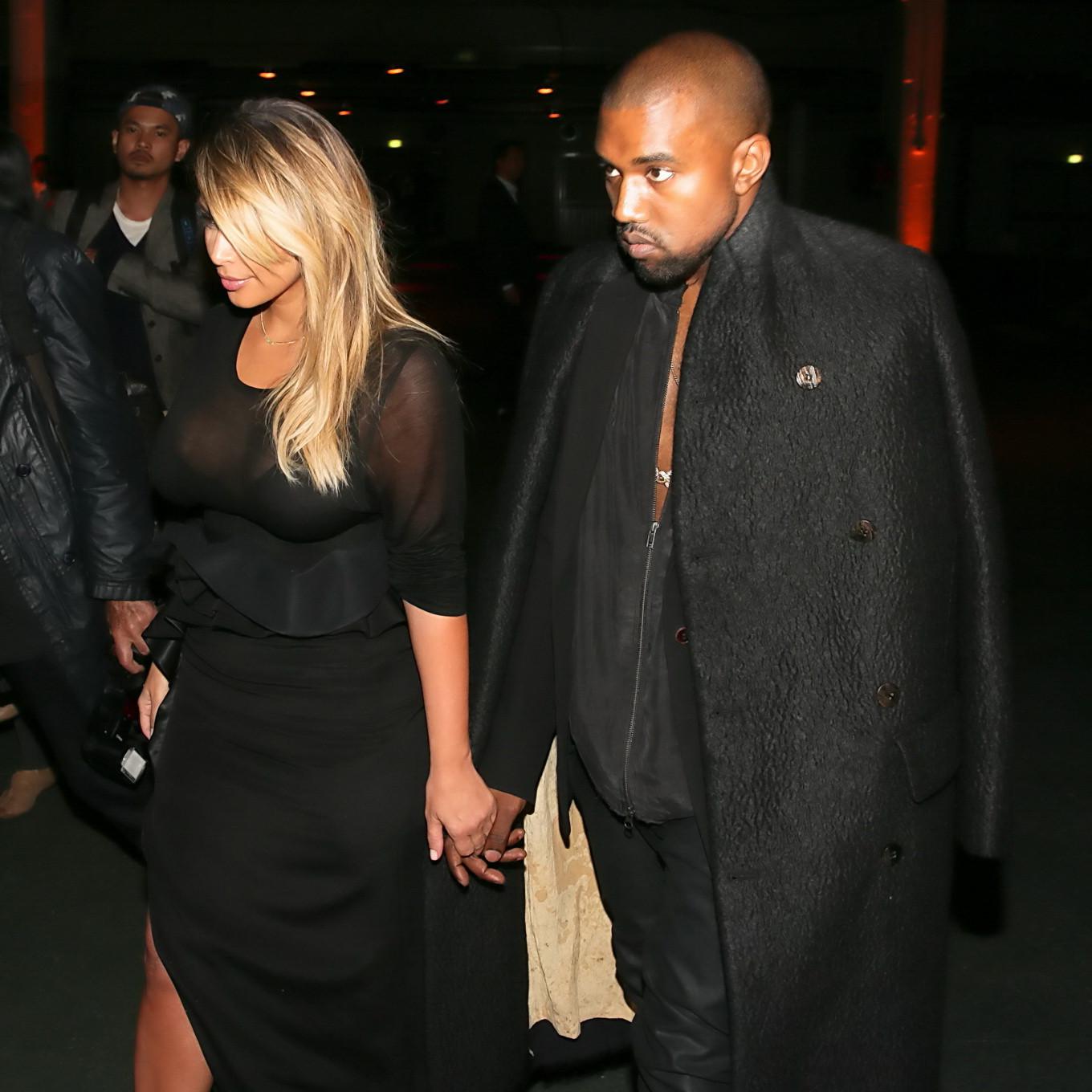 16P Kim Kardashian caught see-through to bra while leaving Givenchy Fashion Show in 