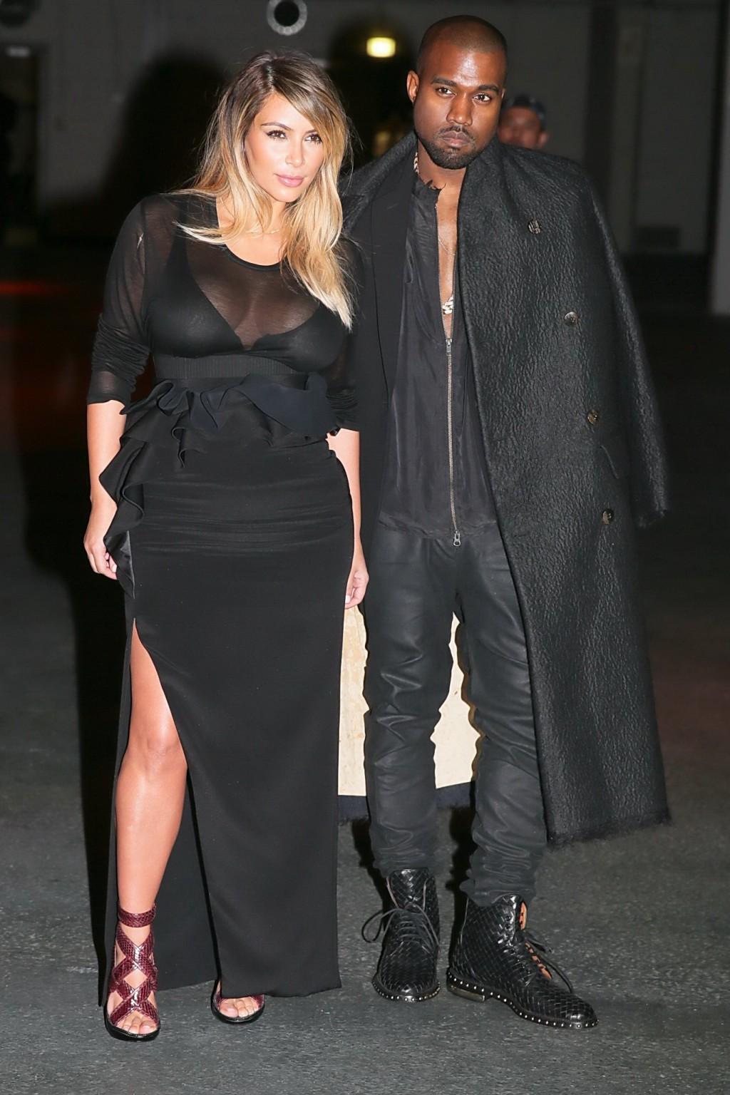 16P Kim Kardashian caught see-through to bra while leaving Givenchy Fashion Show in 