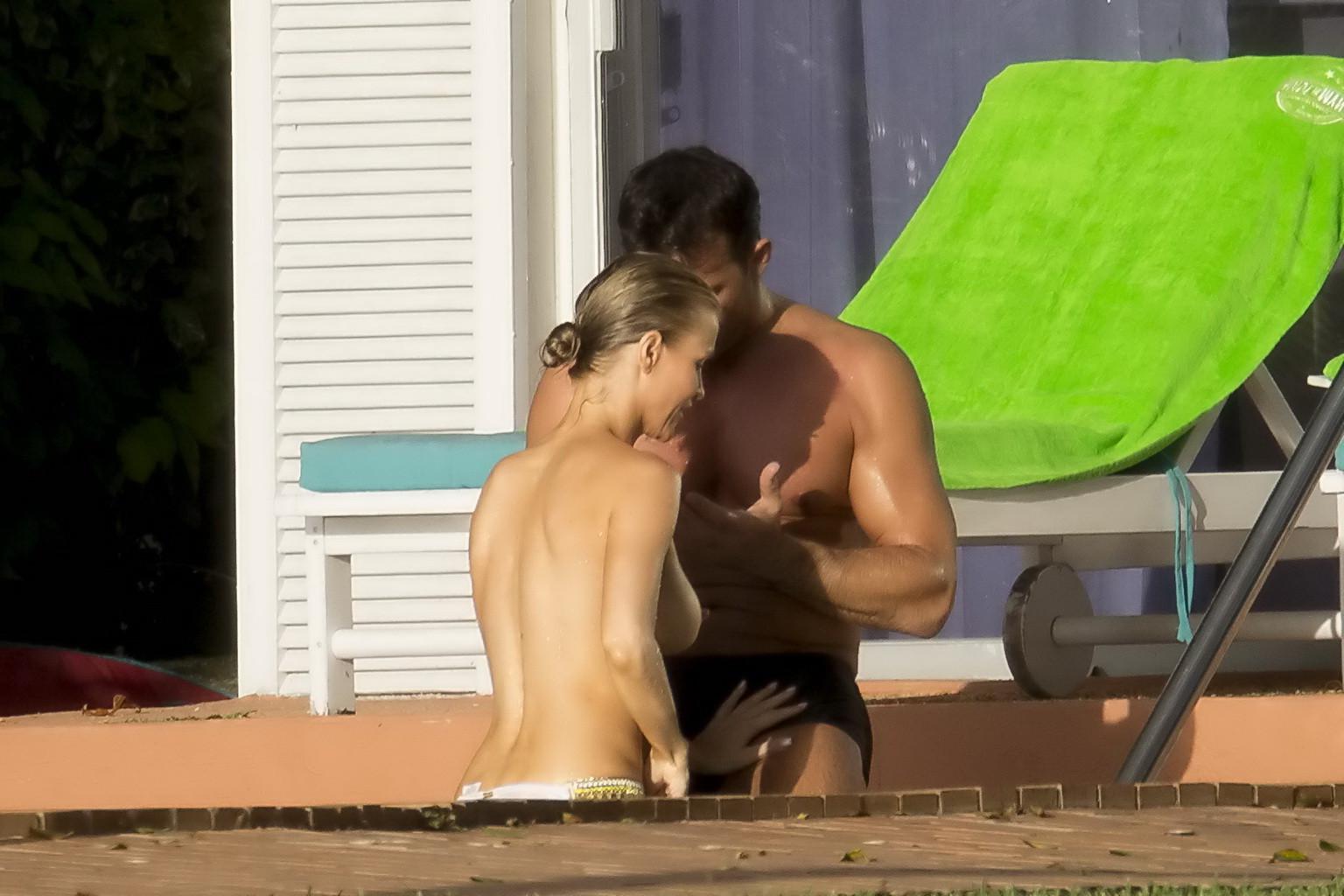 16P Joanna Krupa caught topless at the pool in Miami