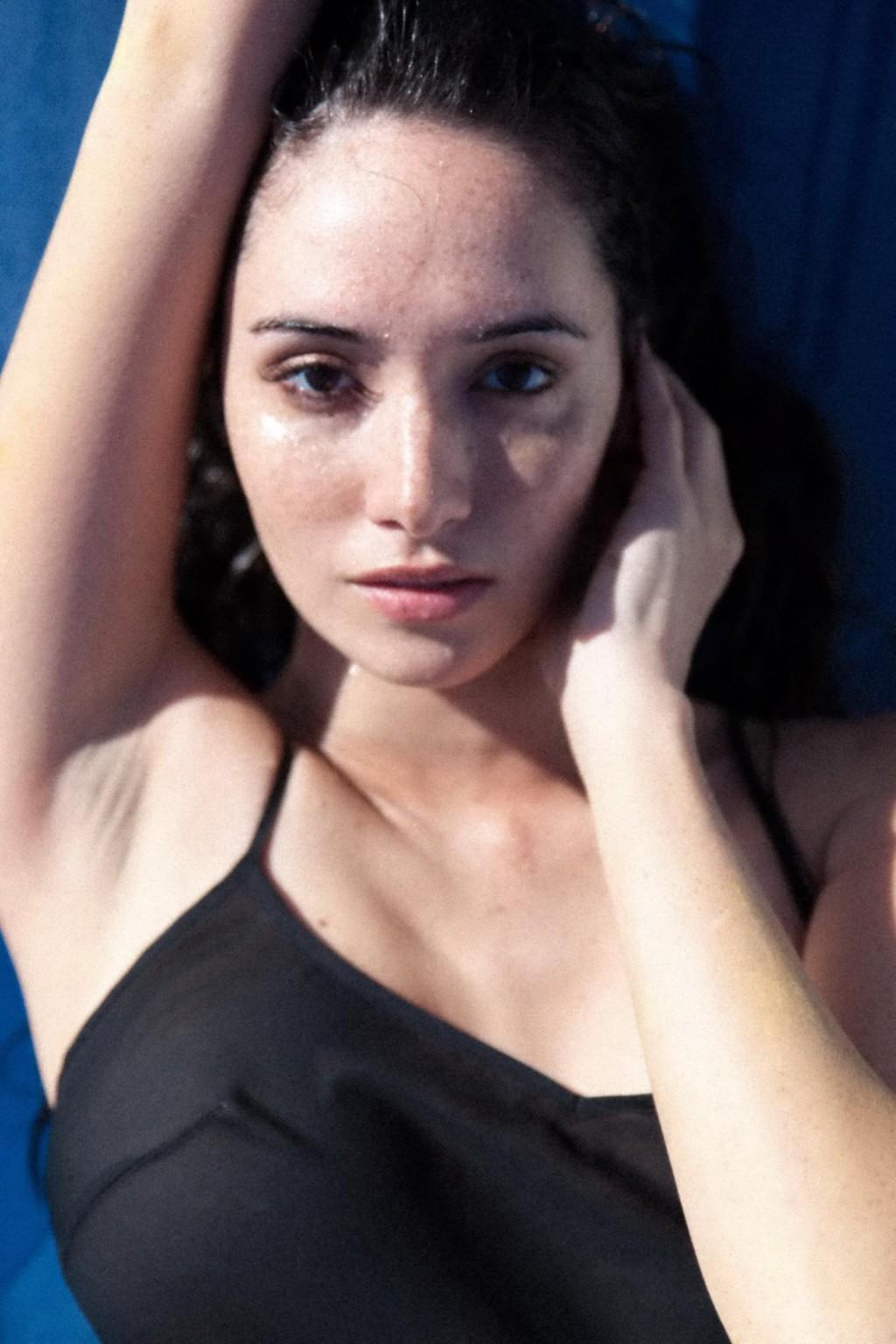 16P Sara Lane showing off her big boobs in the Michael Benatar photoshoot