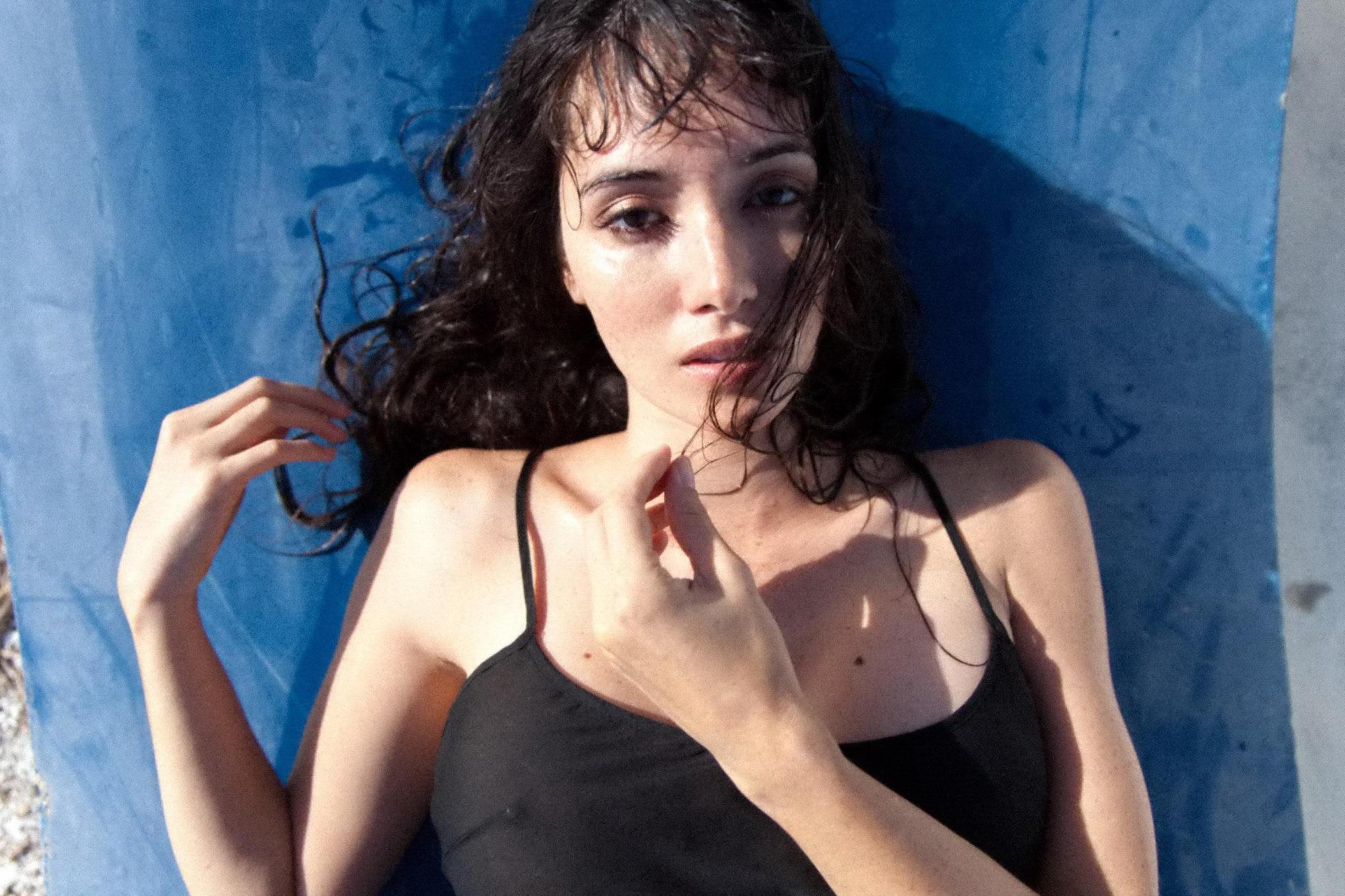 16P Sara Lane showing off her big boobs in the Michael Benatar photoshoot