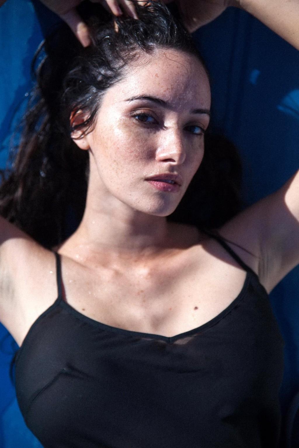 16P Sara Lane showing off her big boobs in the Michael Benatar photoshoot
