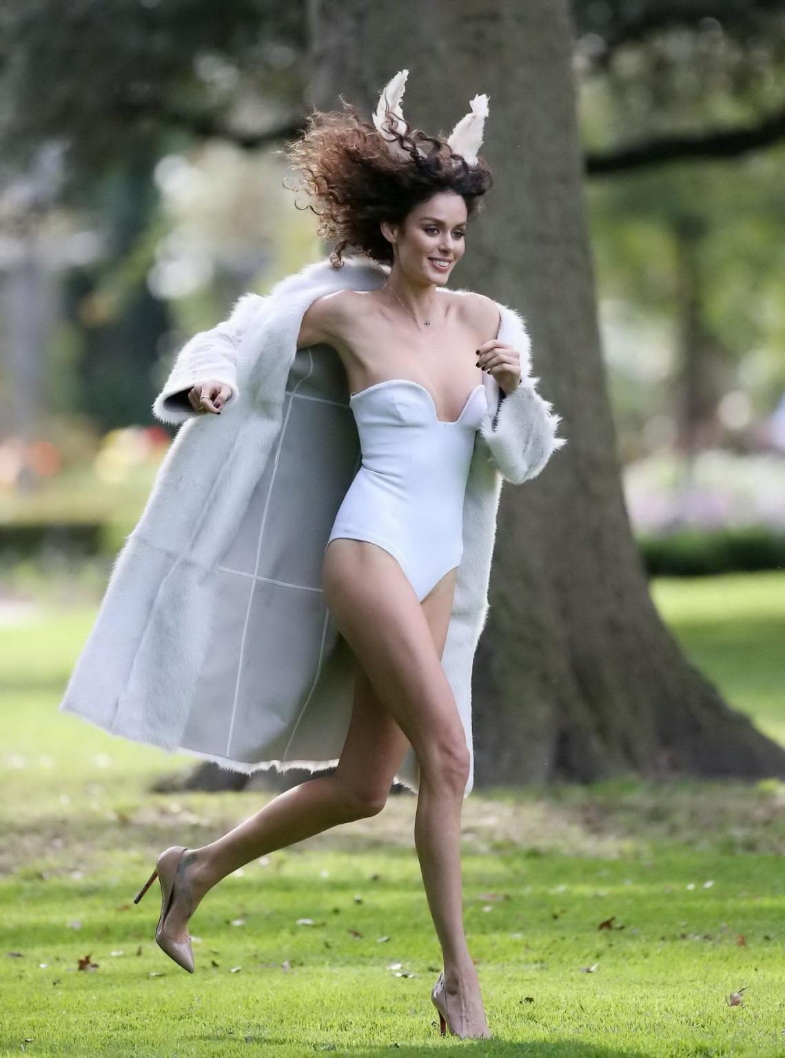 16P Nicole Trunfio slips out of her white tube bodysuit while shooting at the garden