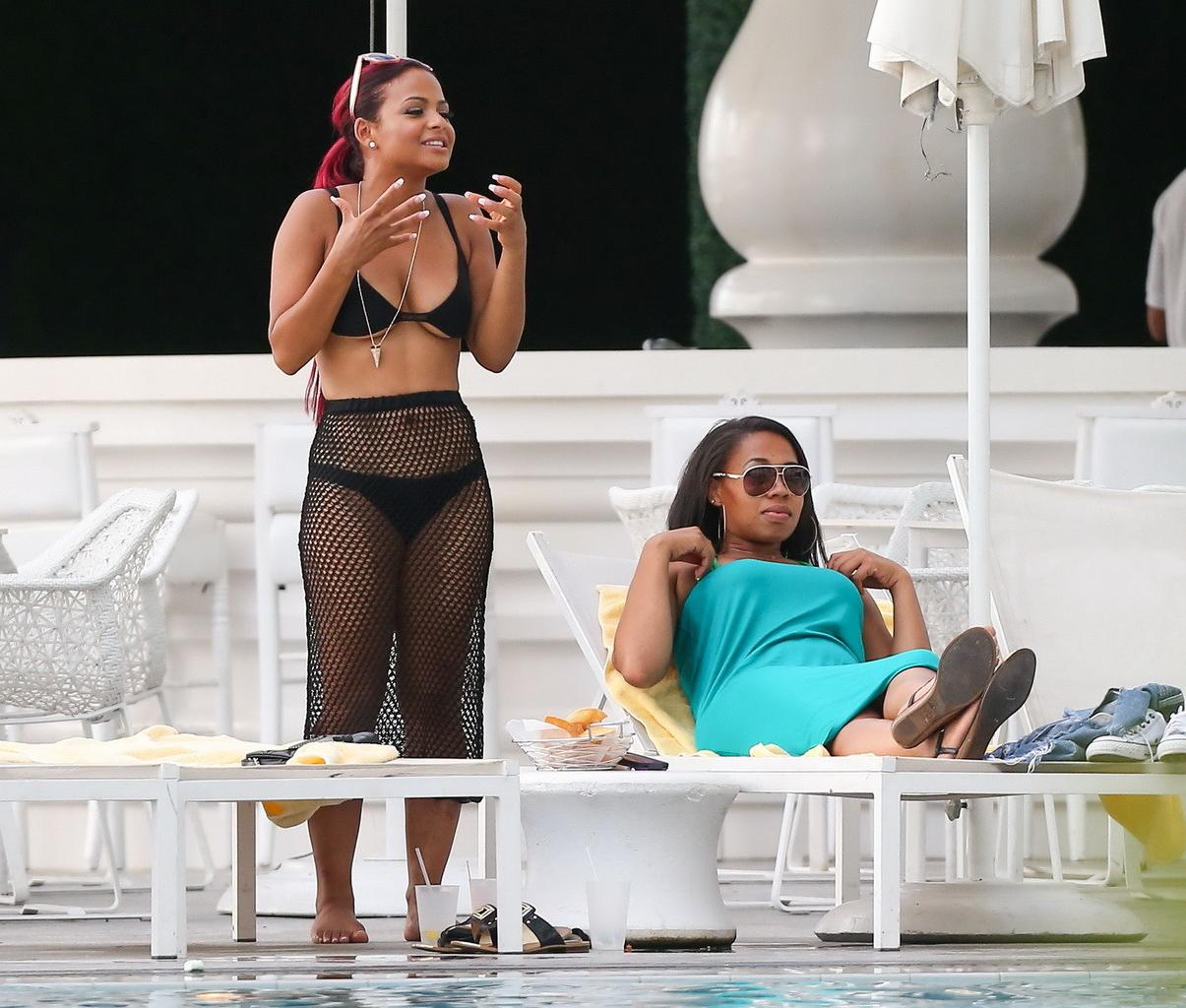 16P Christina Milian smoking hot in tiny black bikini poolside in South Beach