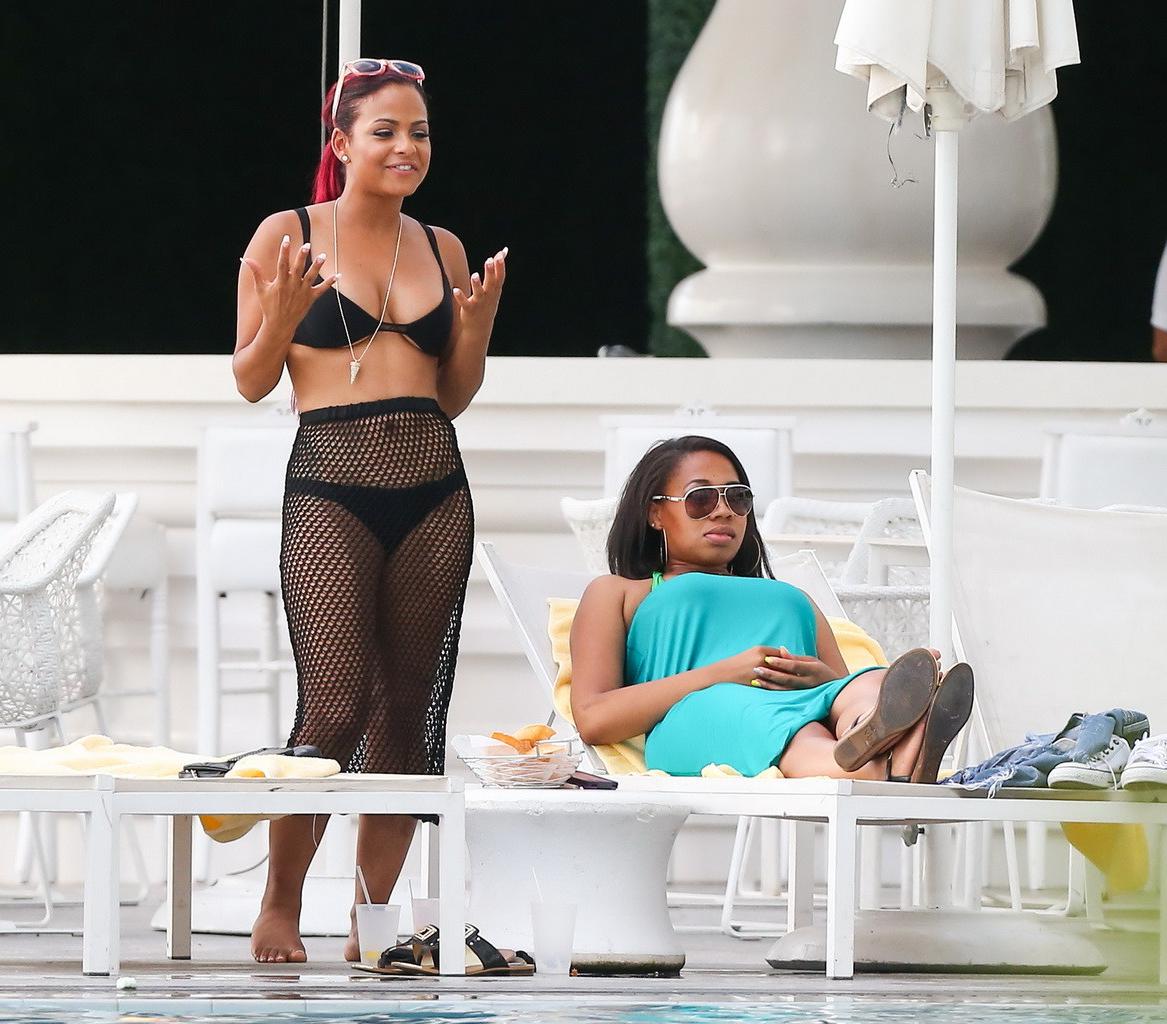 16P Christina Milian smoking hot in tiny black bikini poolside in South Beach