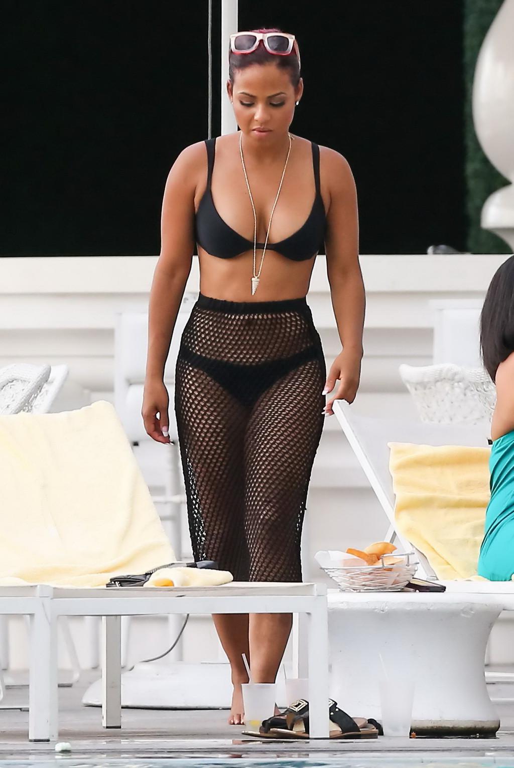 16P Christina Milian smoking hot in tiny black bikini poolside in South Beach