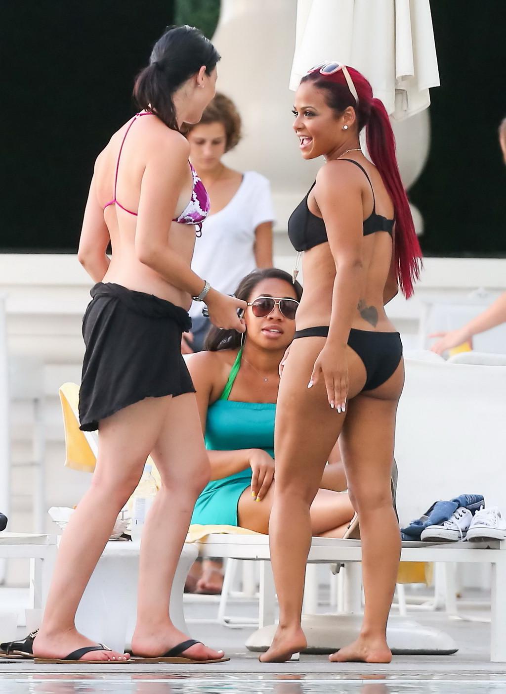 16P Christina Milian smoking hot in tiny black bikini poolside in South Beach