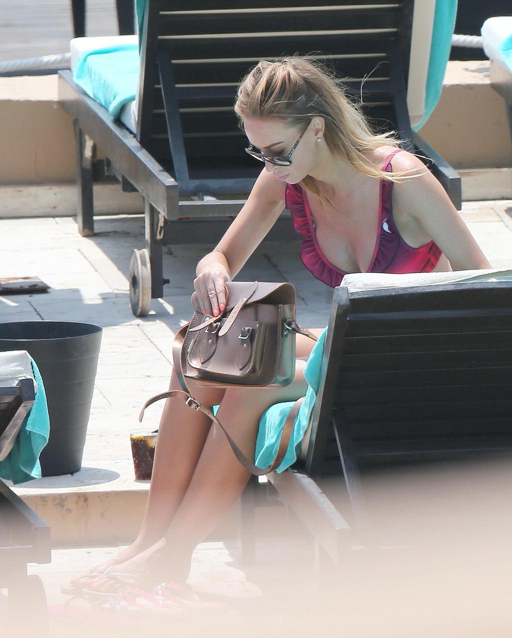 16P Lauren Pope caught between a sets wearing various bikins poolside in Marbella