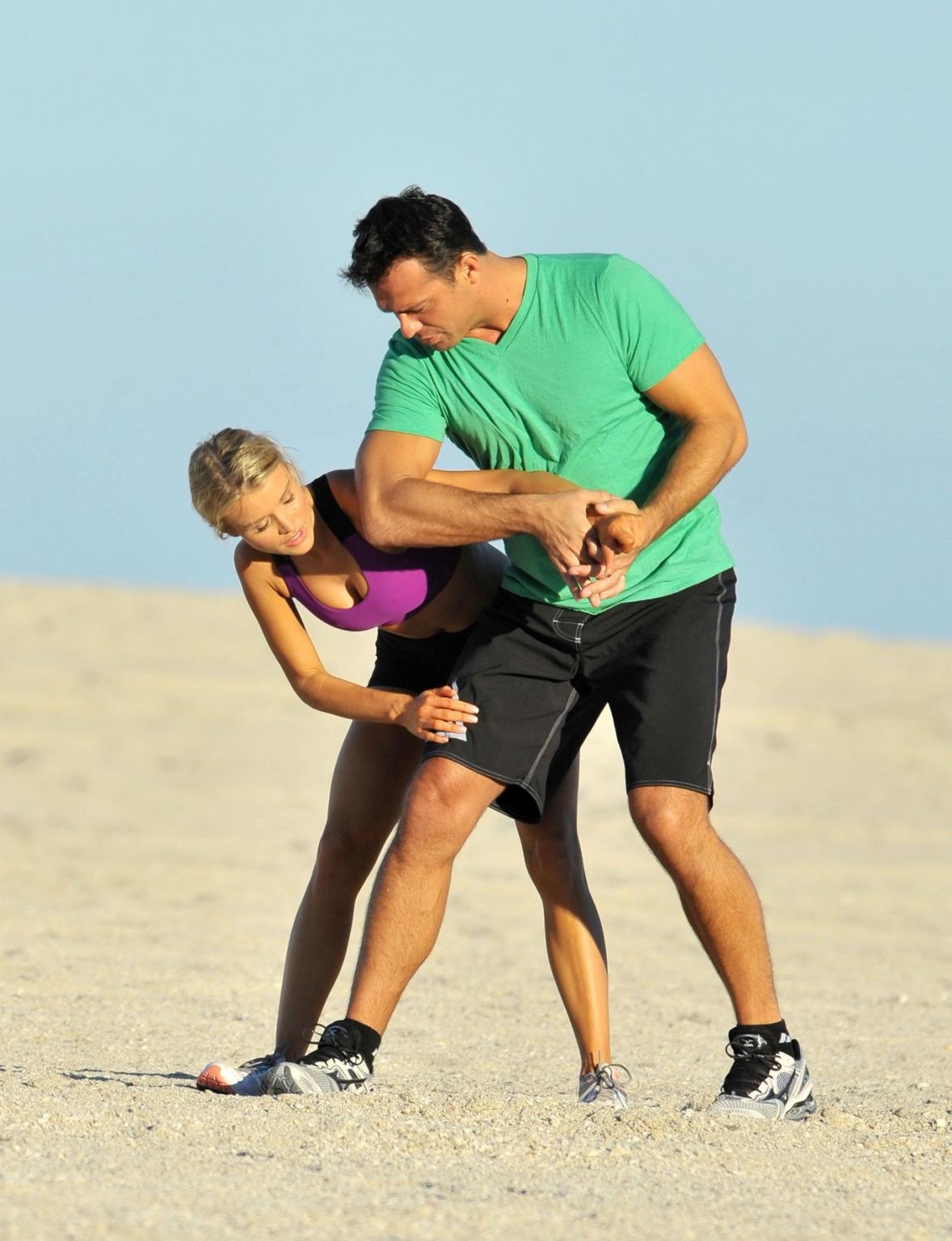 10P Joanna Krupa in tight shorts and sport bra at Miami Beach getting groped or just