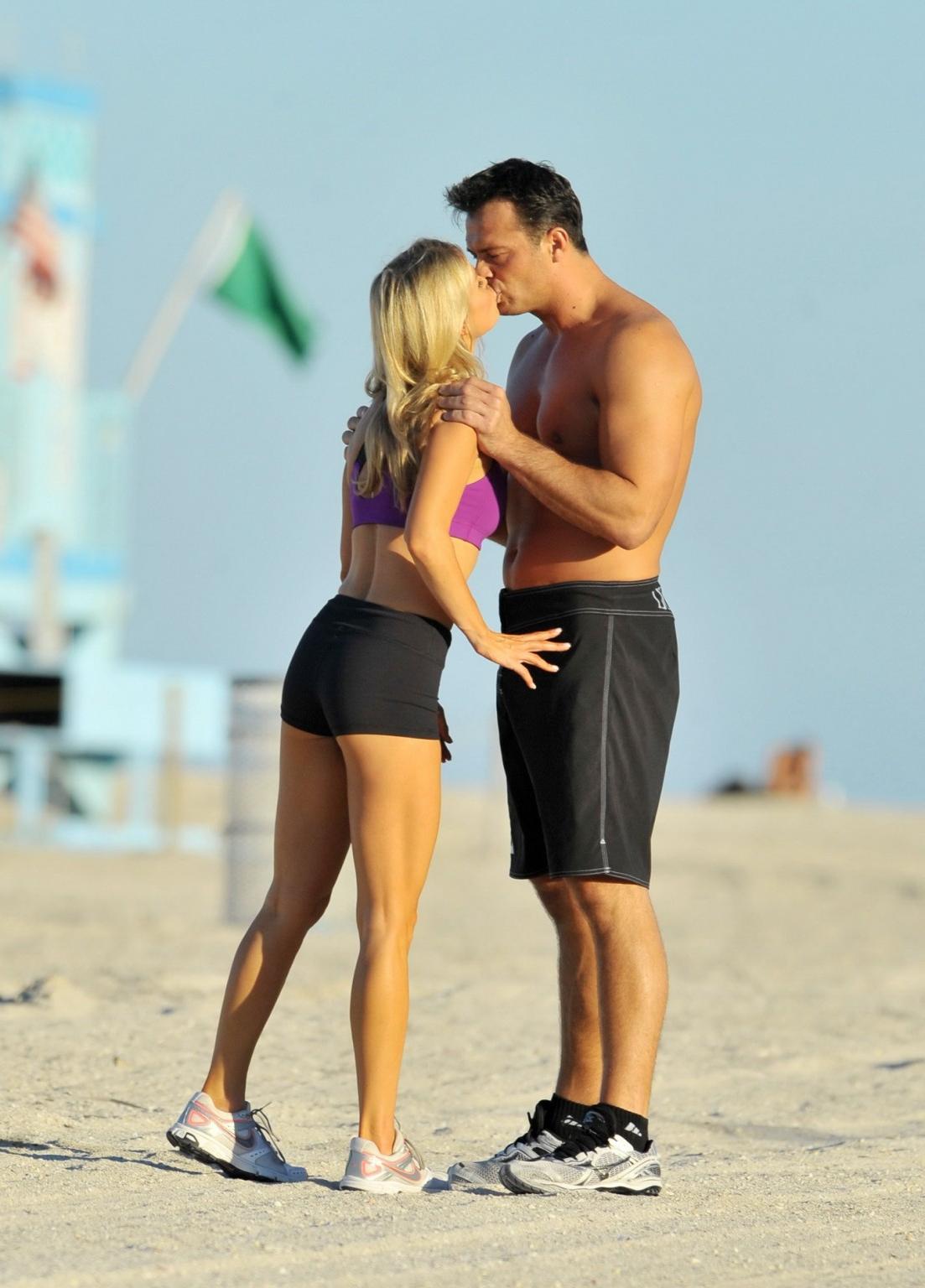 10P Joanna Krupa in tight shorts and sport bra at Miami Beach getting groped or just