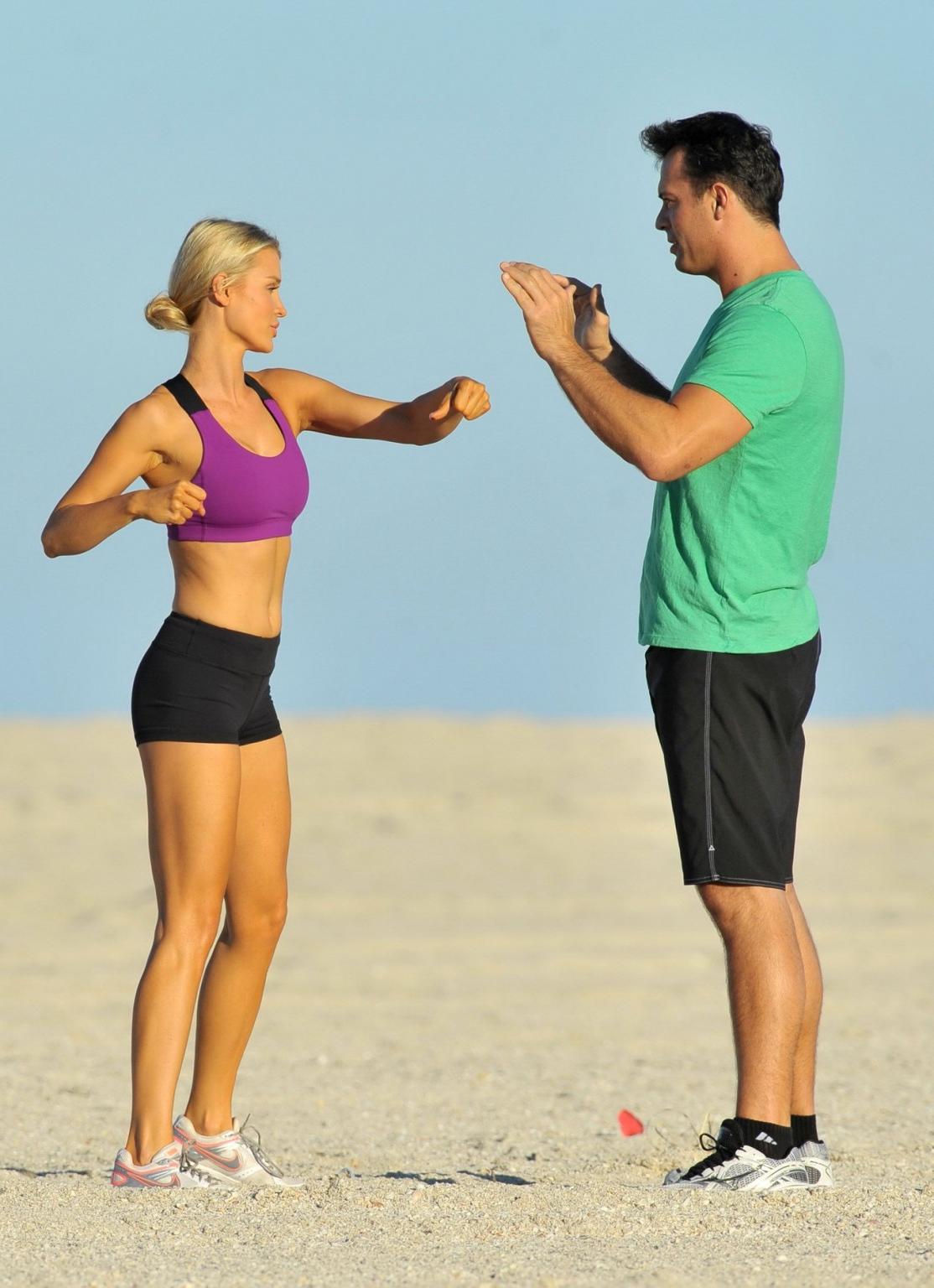 10P Joanna Krupa in tight shorts and sport bra at Miami Beach getting groped or just