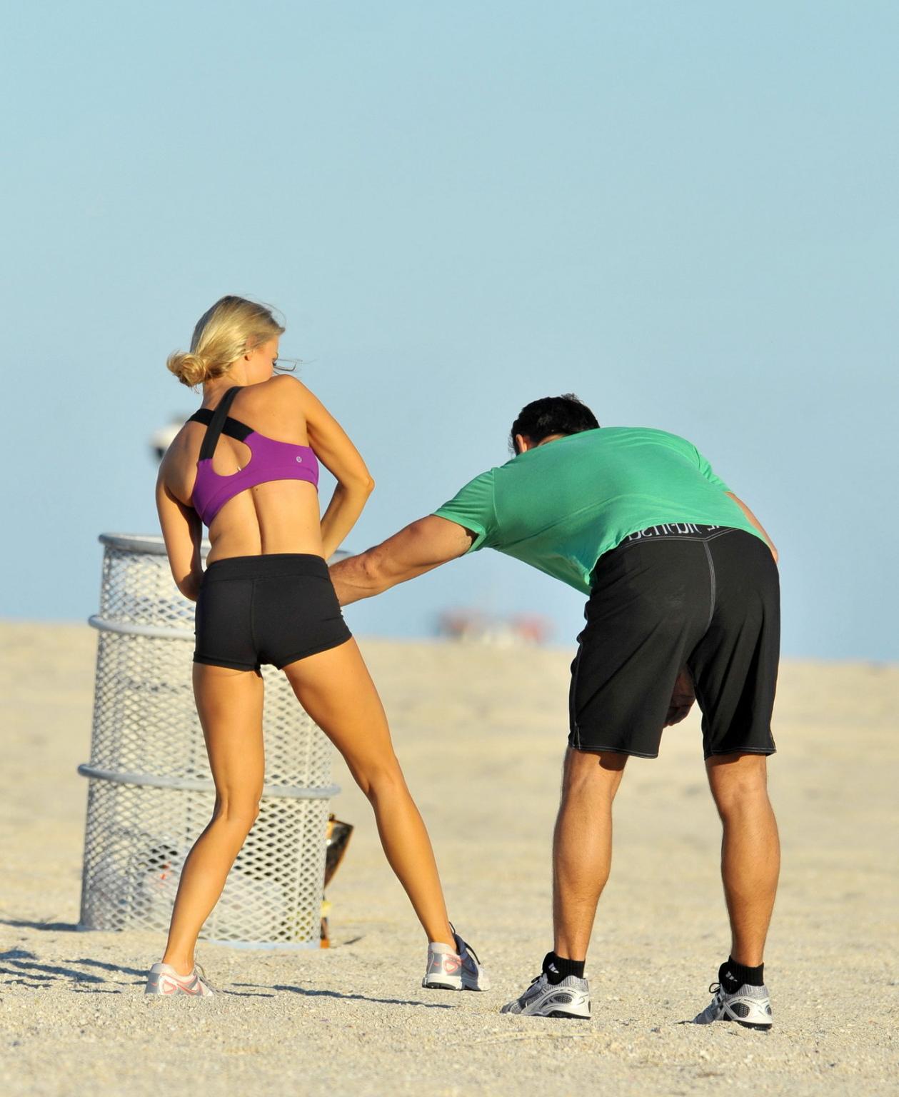 10P Joanna Krupa in tight shorts and sport bra at Miami Beach getting groped or just