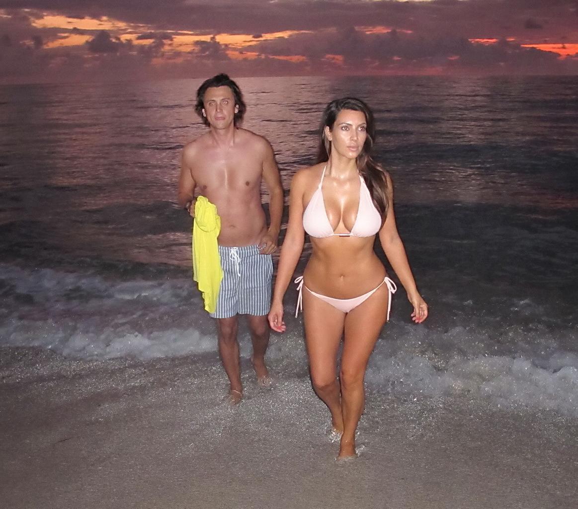 10P Kim Kardashian caught at night bath in tiny flesh colored bikini at the beach in