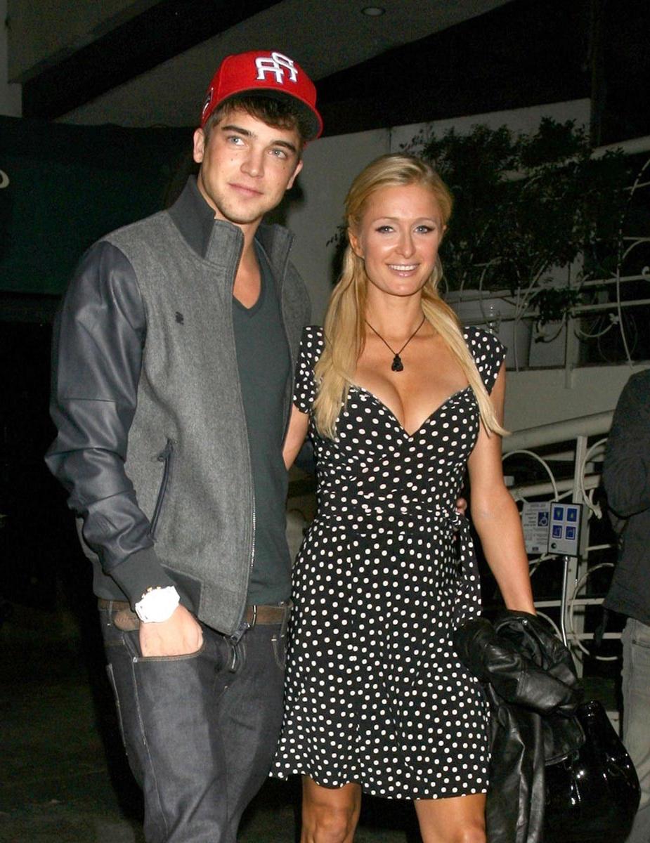 15P Paris Hilton gives nice view of her perky tits