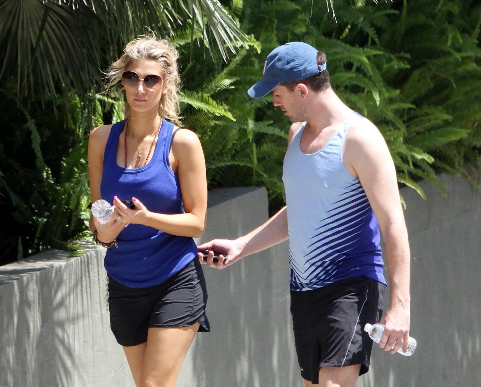 10P Delta Goodrem hiking in LA wearing sports bra  shorts