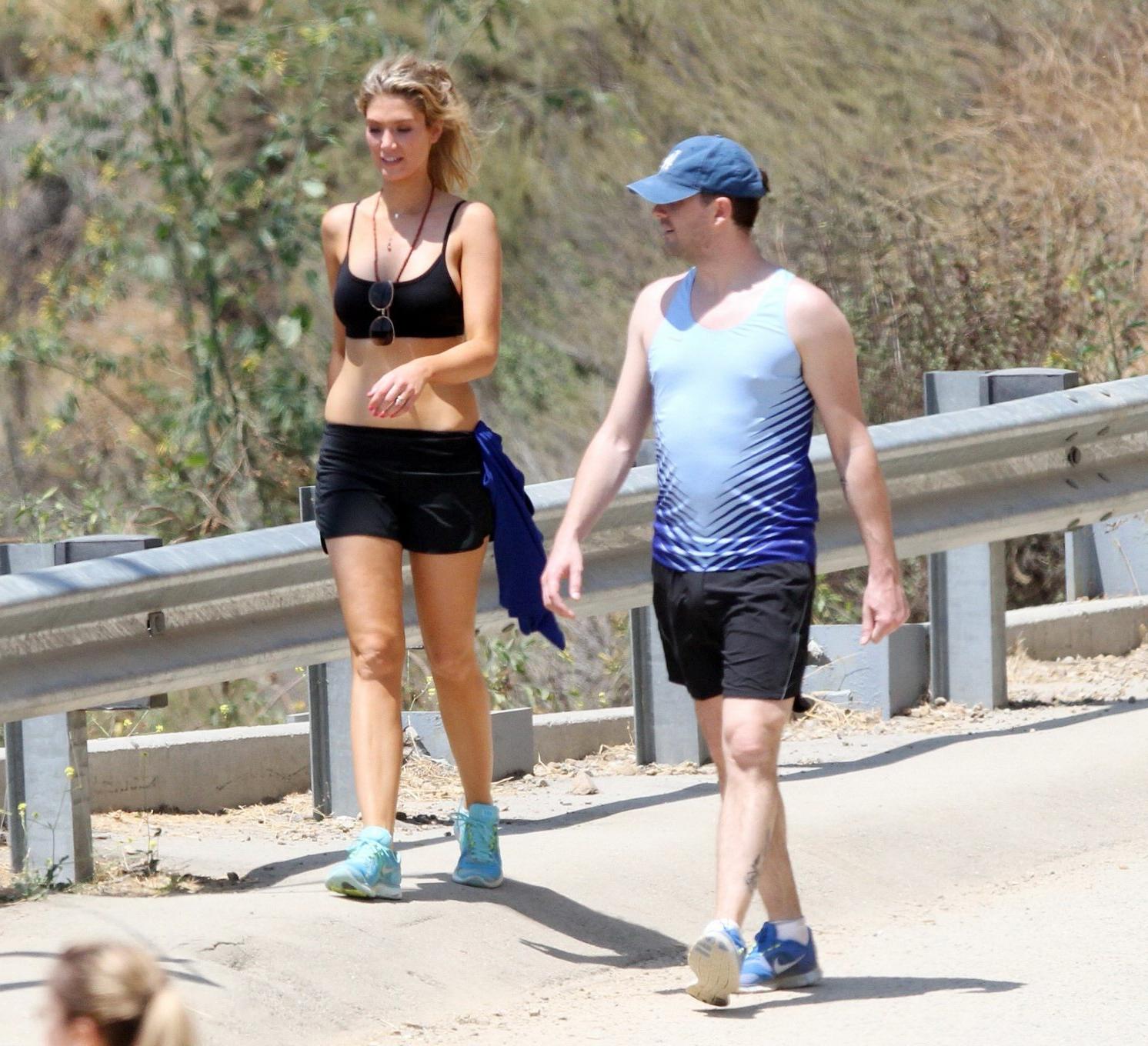 10P Delta Goodrem hiking in LA wearing sports bra  shorts