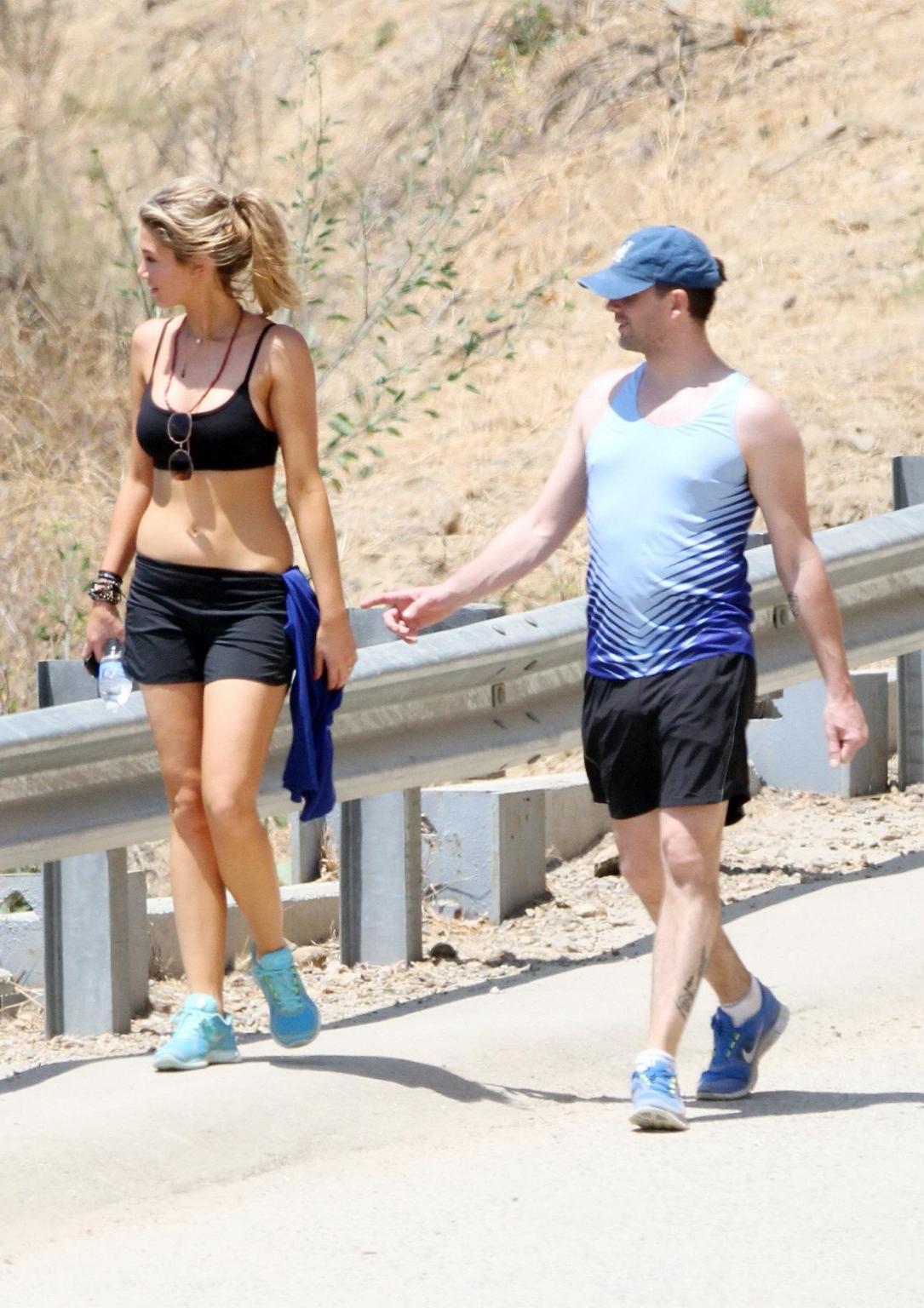 10P Delta Goodrem hiking in LA wearing sports bra  shorts