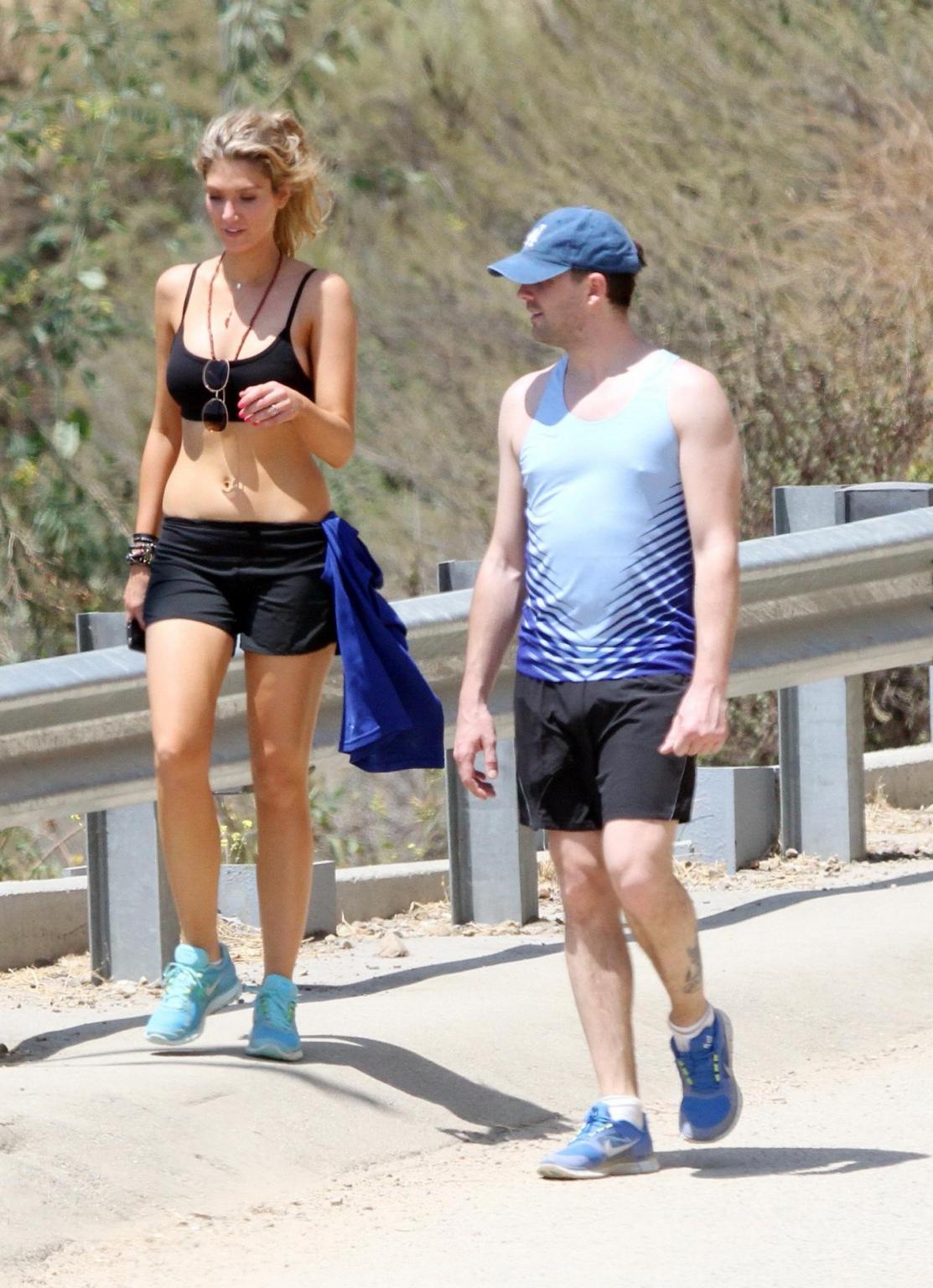 10P Delta Goodrem hiking in LA wearing sports bra  shorts