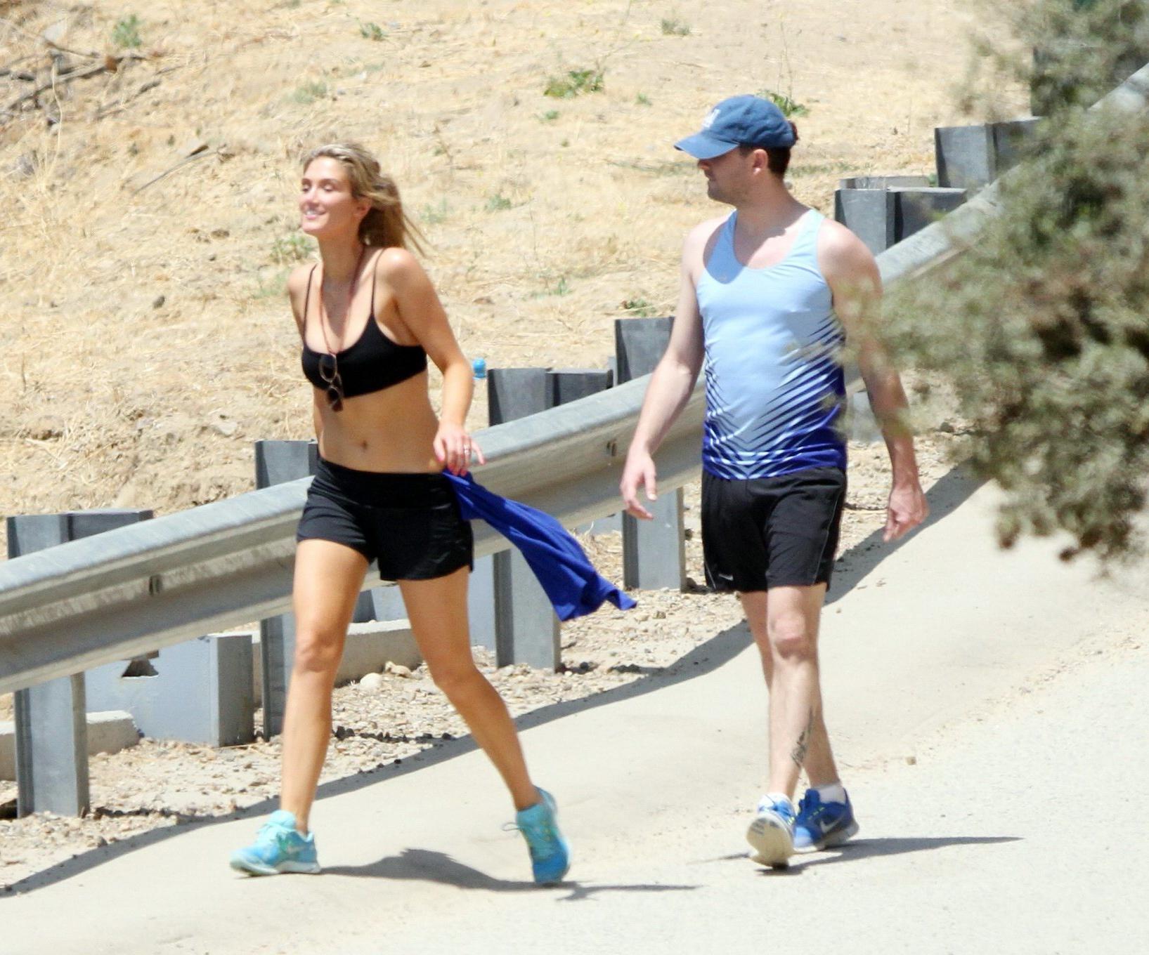 10P Delta Goodrem hiking in LA wearing sports bra  shorts