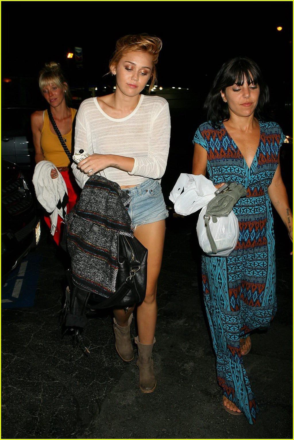 10P Miley Cyrus braless showing pokies at the photoshoot in Malibu