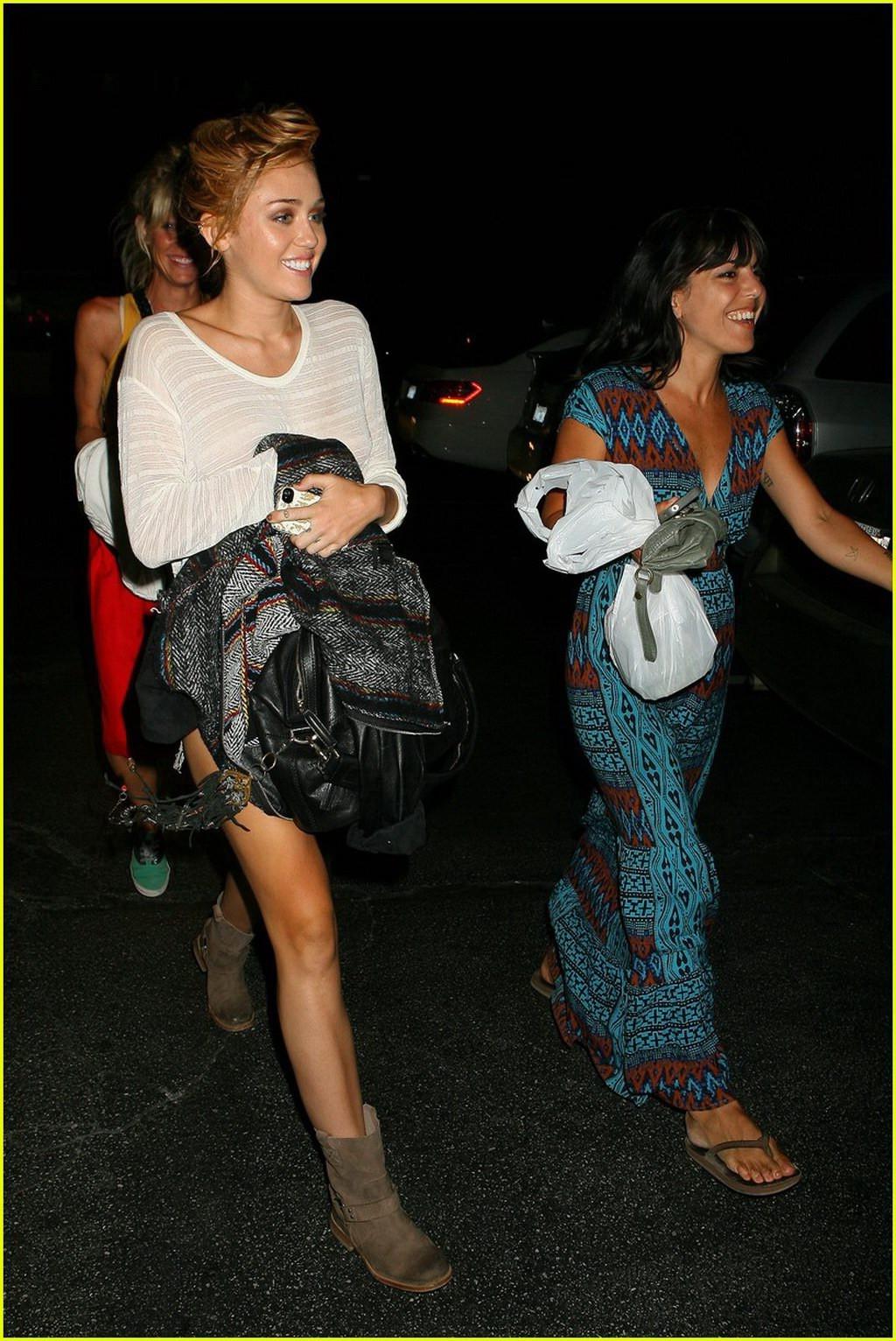 10P Miley Cyrus braless showing pokies at the photoshoot in Malibu