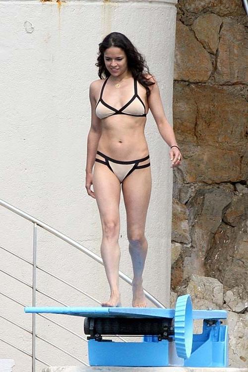 10P Michelle Rodriguez caught in sexy bikini on the beach
