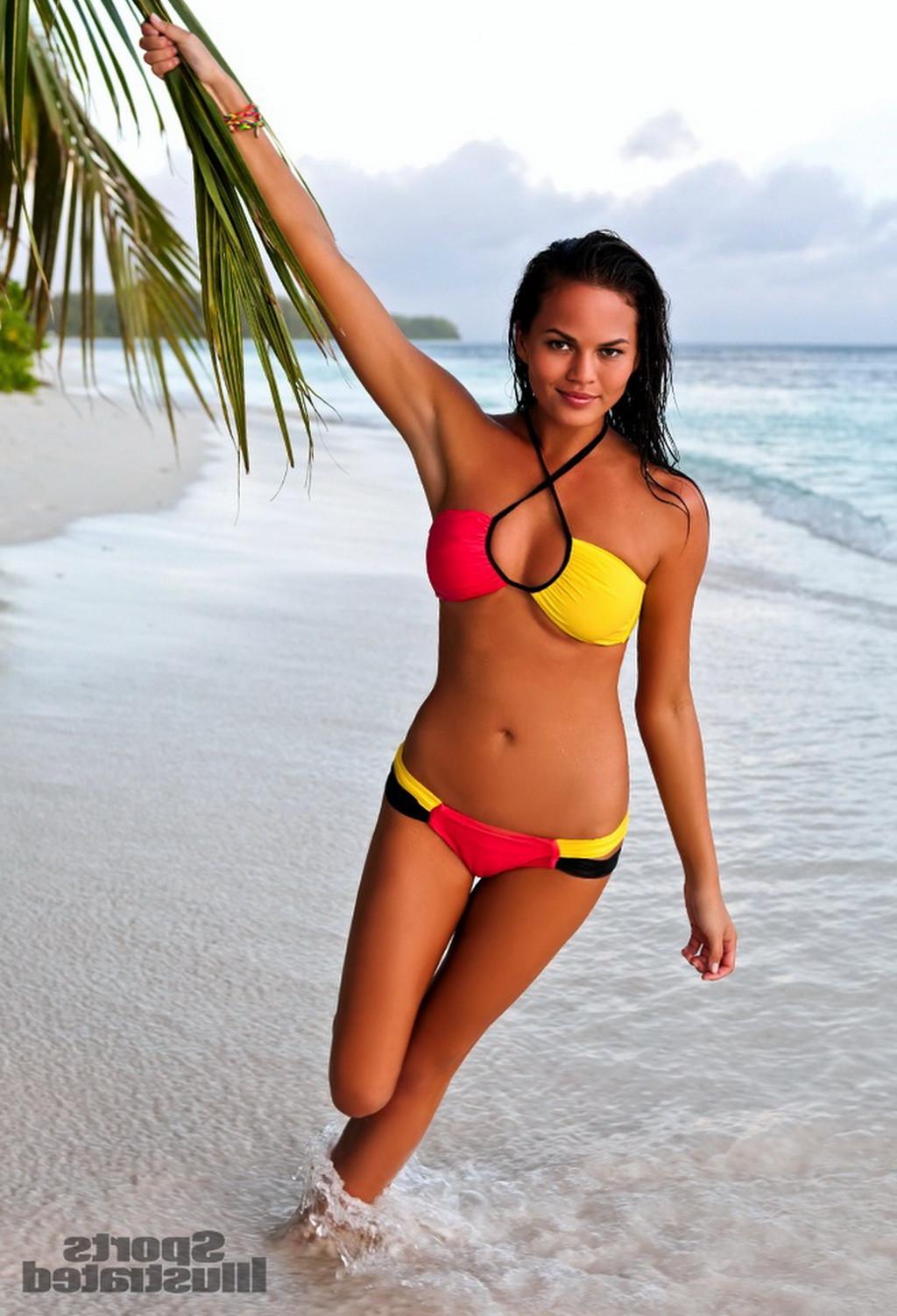 16P Christine Teigen showing boobs in some seethru bikini at Sports Illustrated 2012