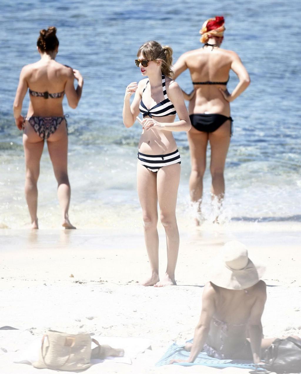16P Taylor Swift caught wearing bikini on a beach in Perth
