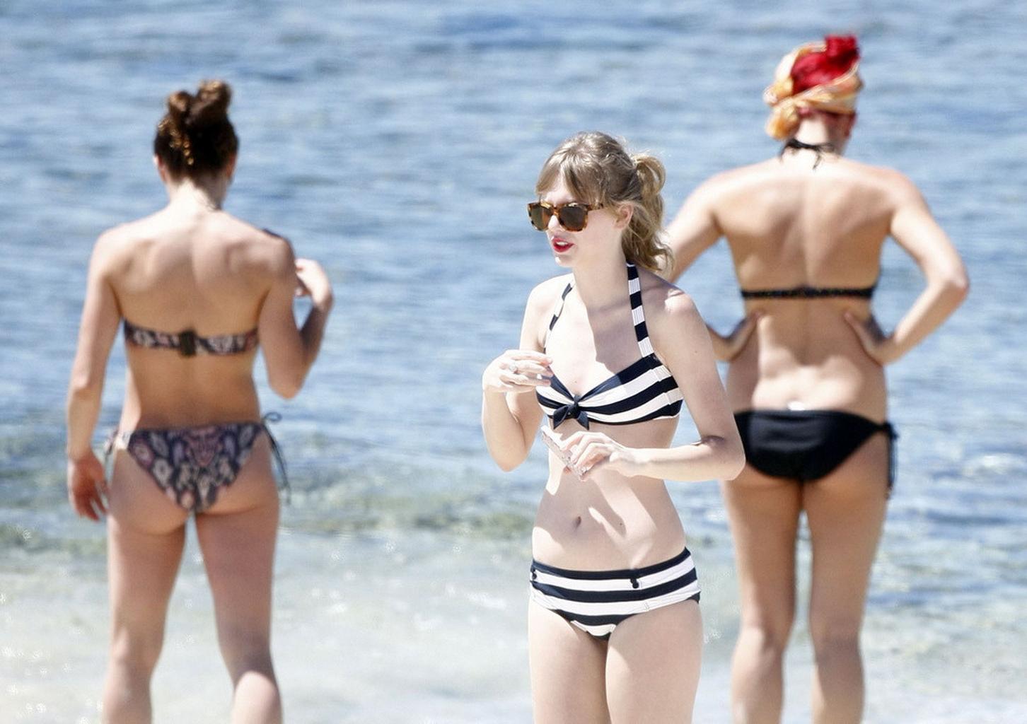 16P Taylor Swift caught wearing bikini on a beach in Perth