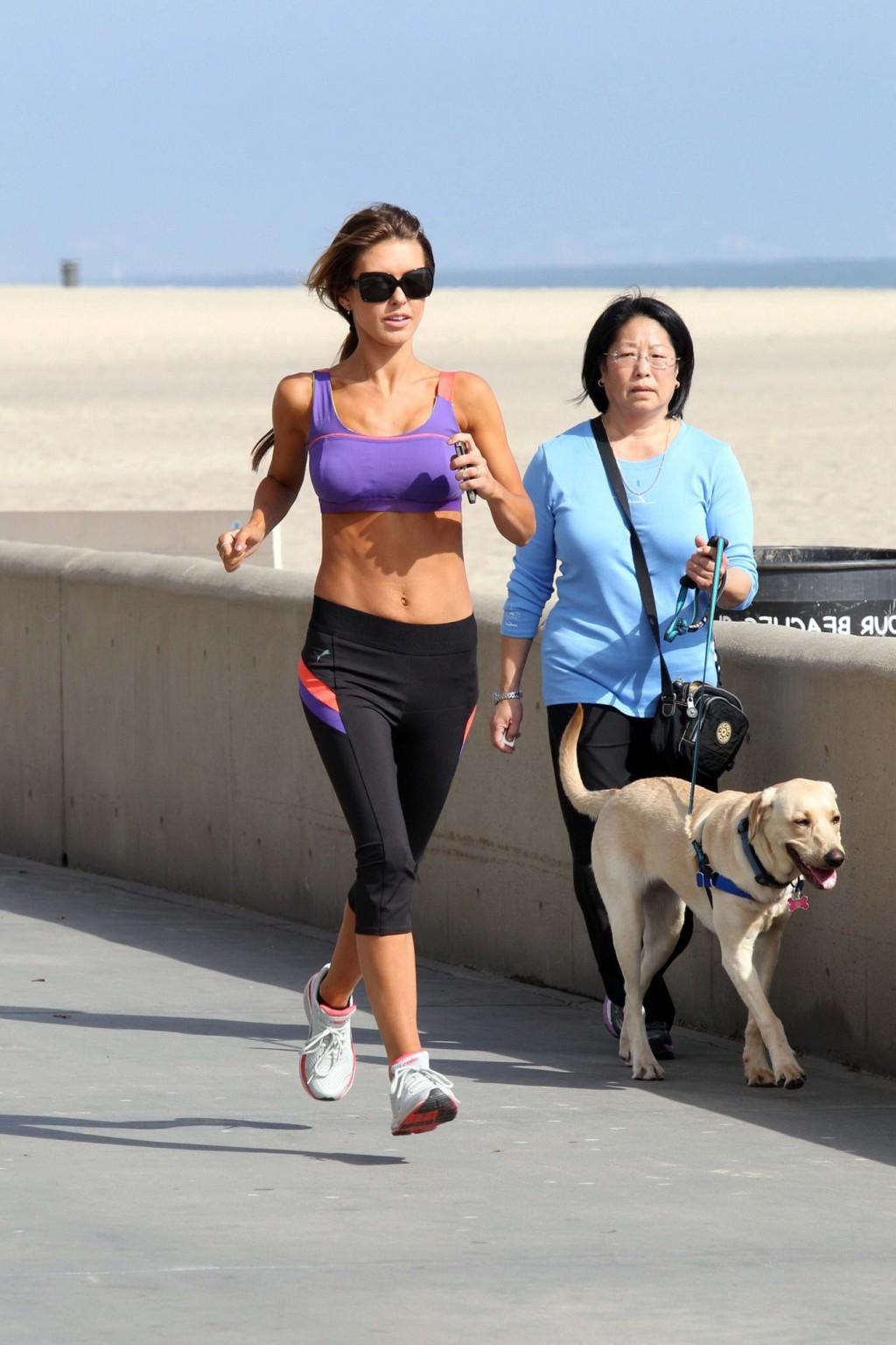 16P Audrina Patridge in sports bra  tights jogging on the beach in LA