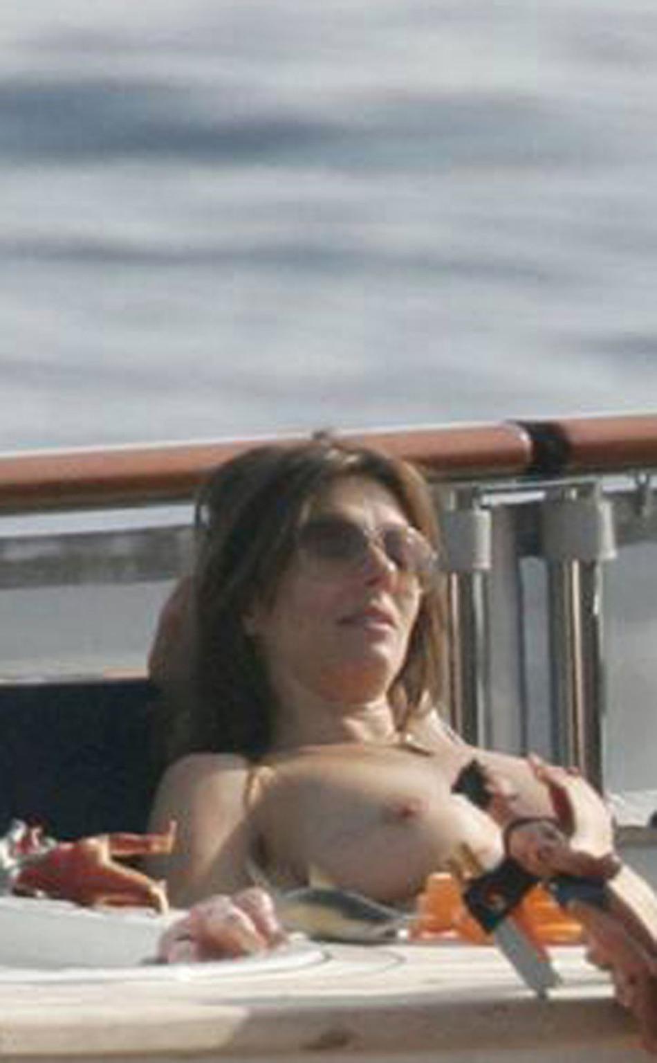 16P Elizabeth Hurley caught topless on vacation