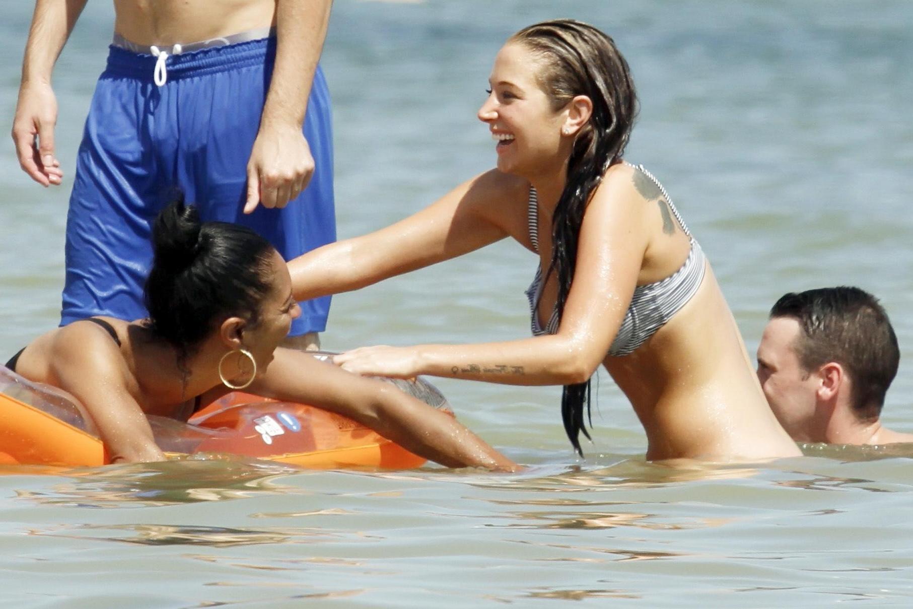 16P Tulisa Contostavlos busty wearing bikini on a Spanish beach