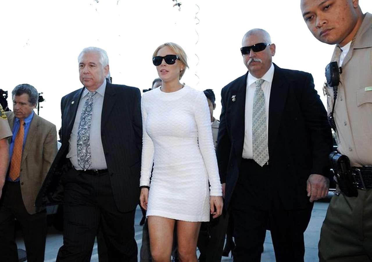 16P Lindsay Lohan leggy in white mini skirt caught by paparazzi