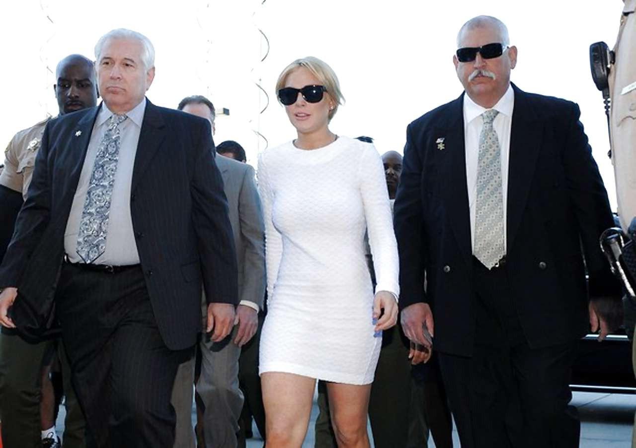16P Lindsay Lohan leggy in white mini skirt caught by paparazzi