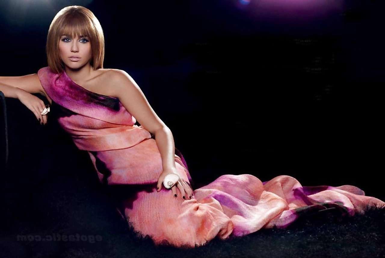 16P Miley Cyrus looking very cute for new photoshoot and posing braless