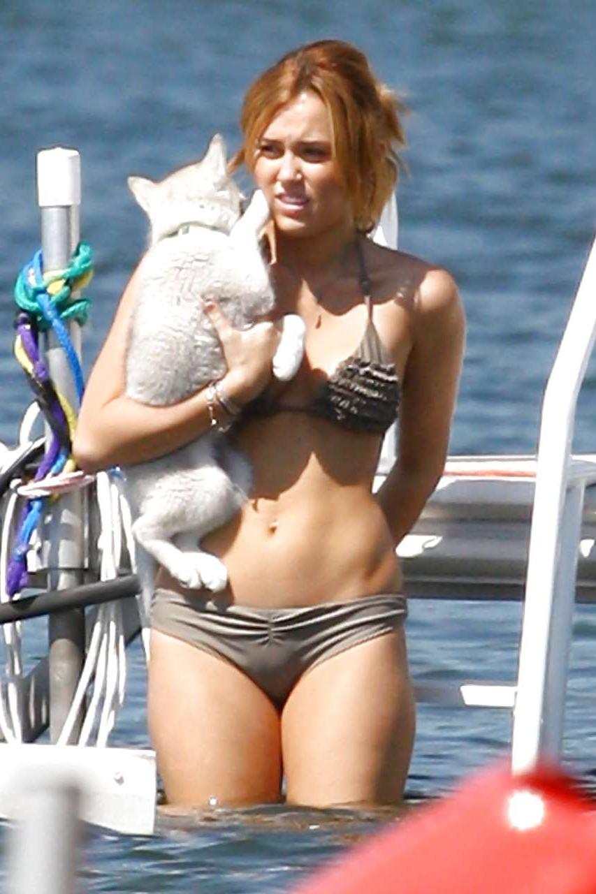 16P Miley Cyrus looking very cute for new photoshoot and posing braless