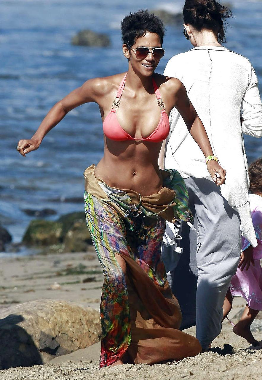 16P Halle Berry show big cleavage in bikini on beach and flashing panties caught by 