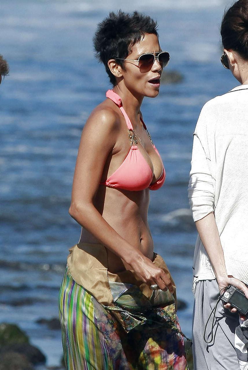 16P Halle Berry show big cleavage in bikini on beach and flashing panties caught by 