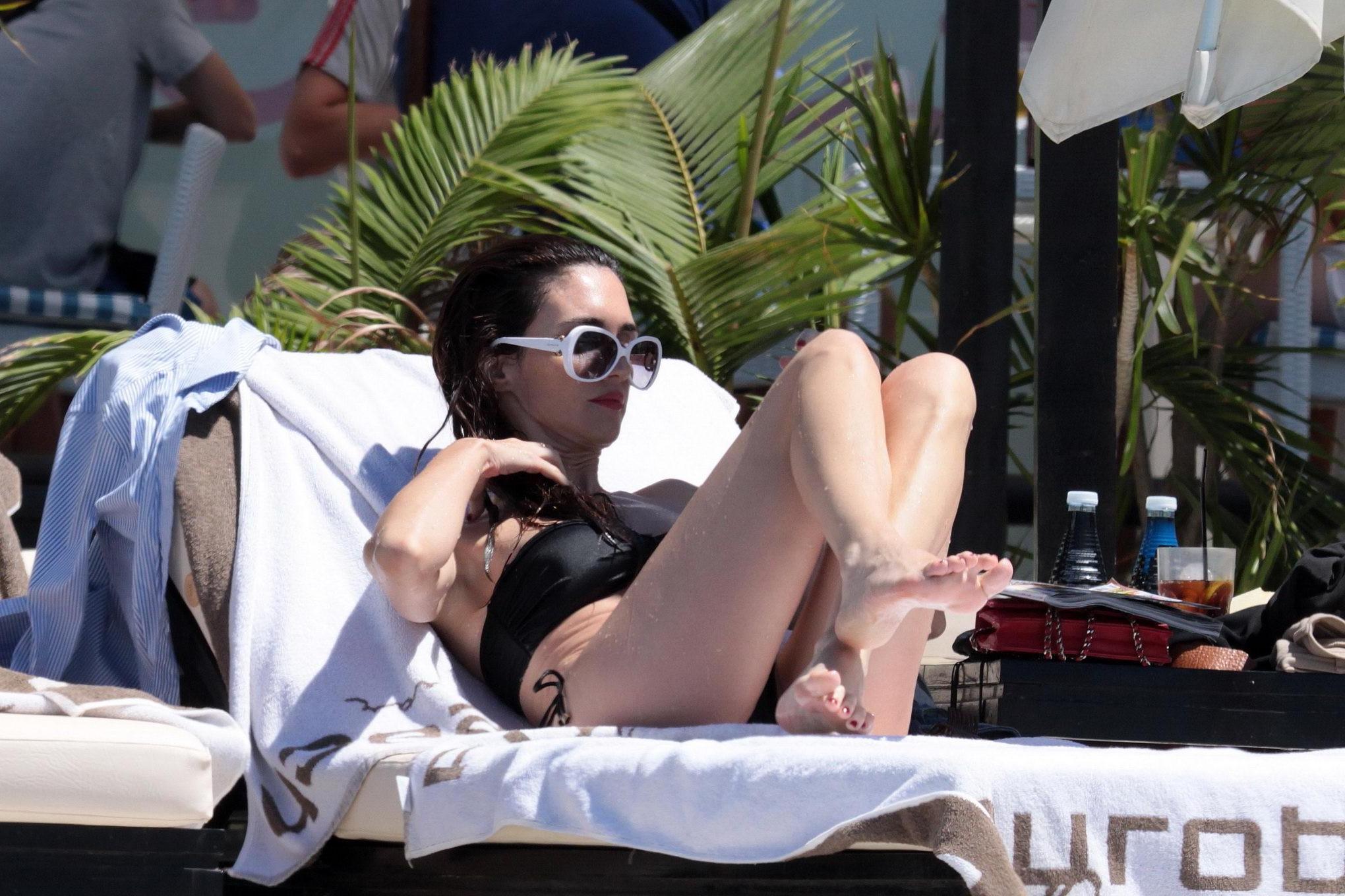 16P Paz Vega wearing two different black bikini sets poolside in Spain