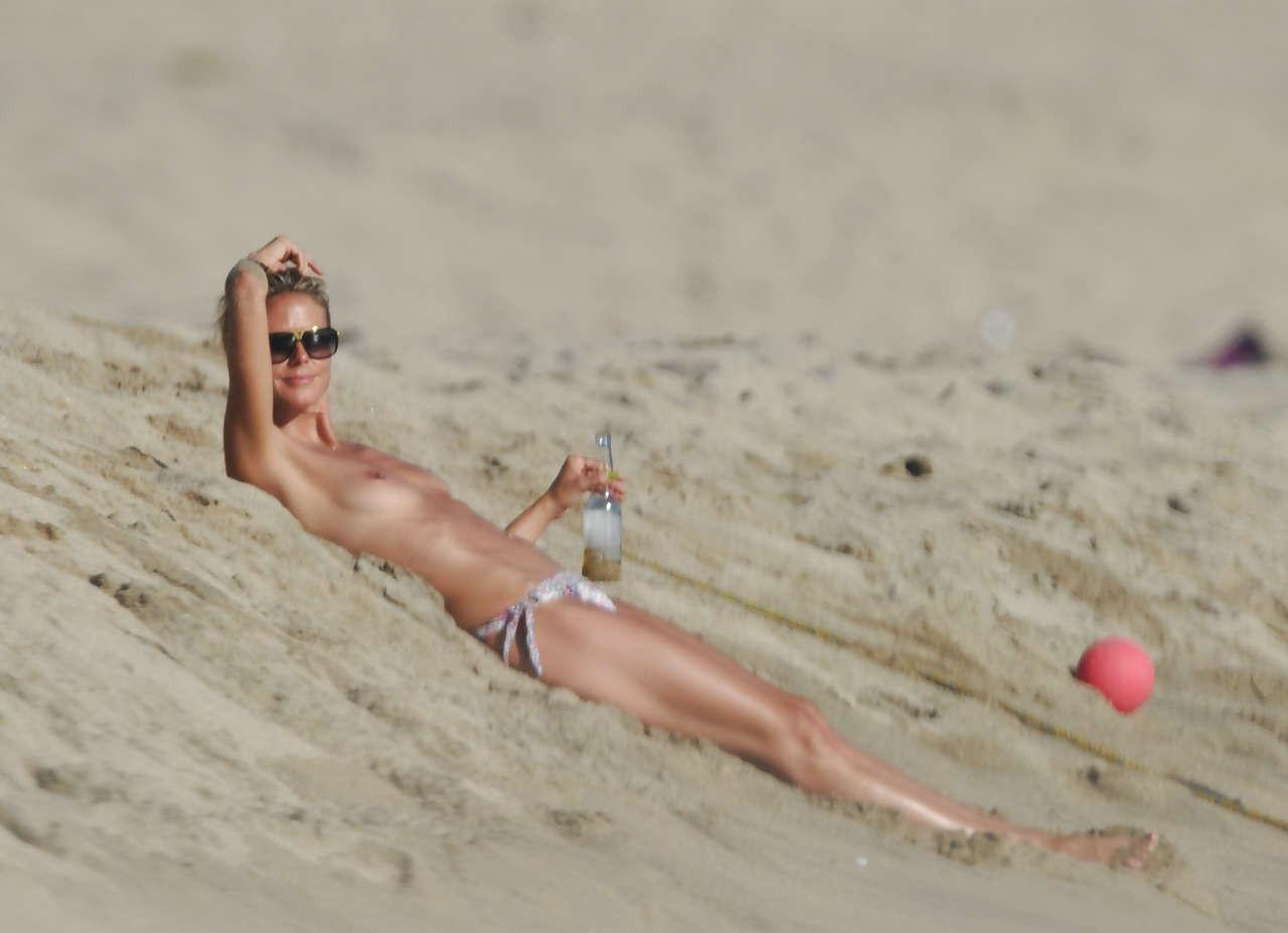 16P Heidi Klum showing her nice tits on beach on vacation caught by paparazzi