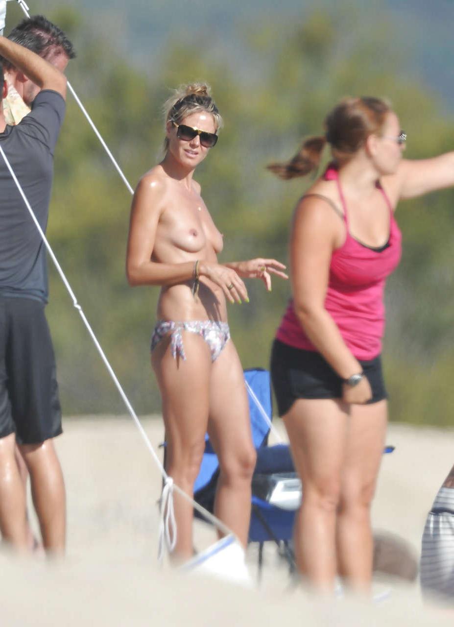 16P Heidi Klum showing her nice tits on beach on vacation caught by paparazzi
