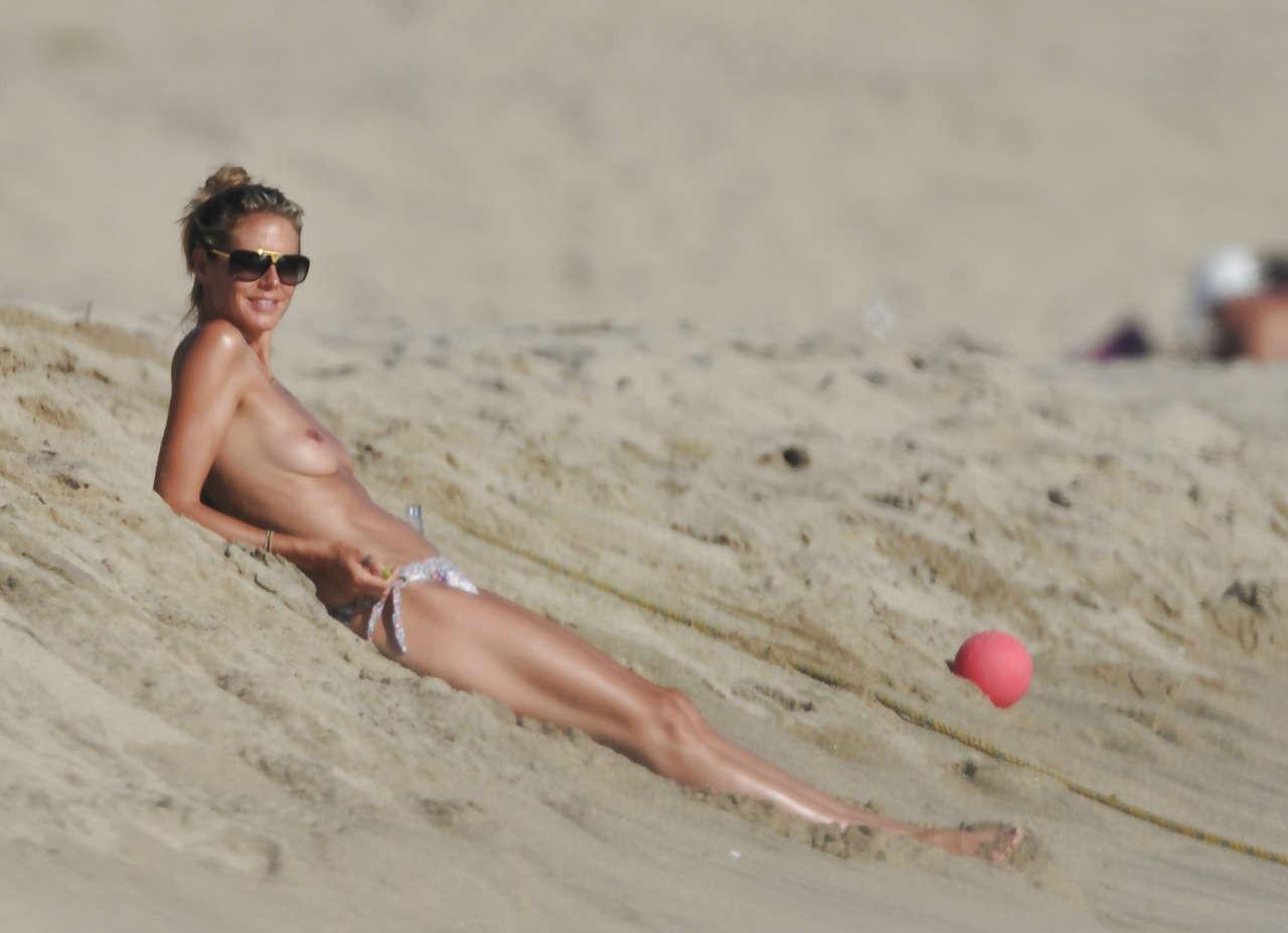 16P Heidi Klum showing her nice tits on beach on vacation caught by paparazzi