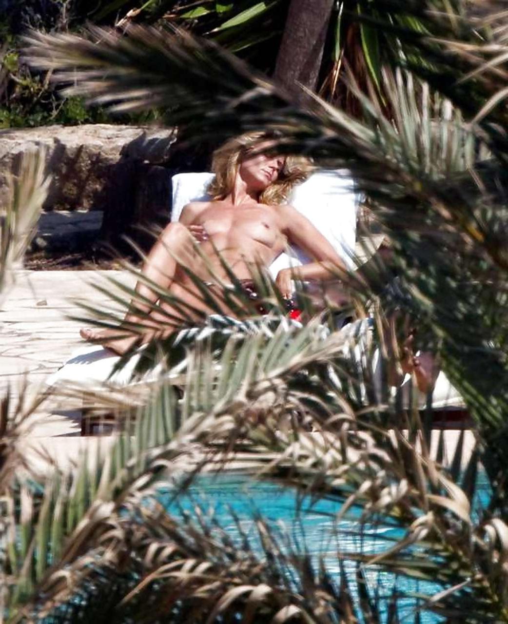 16P Heidi Klum showing her nice tits on beach on vacation caught by paparazzi