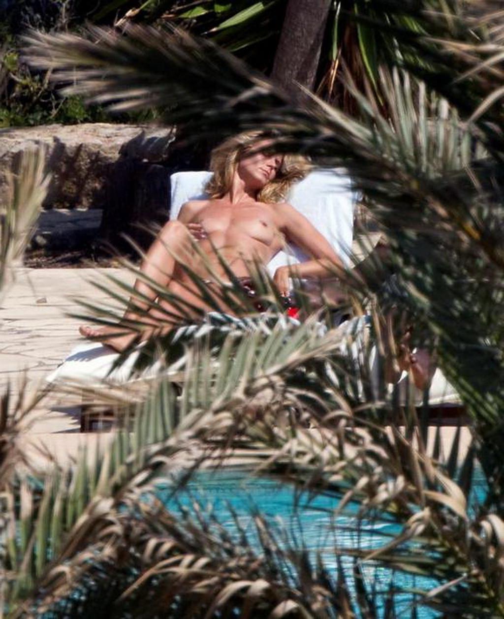 16P Heidi Klum caught sunbathing topless on vacation in Ibiza