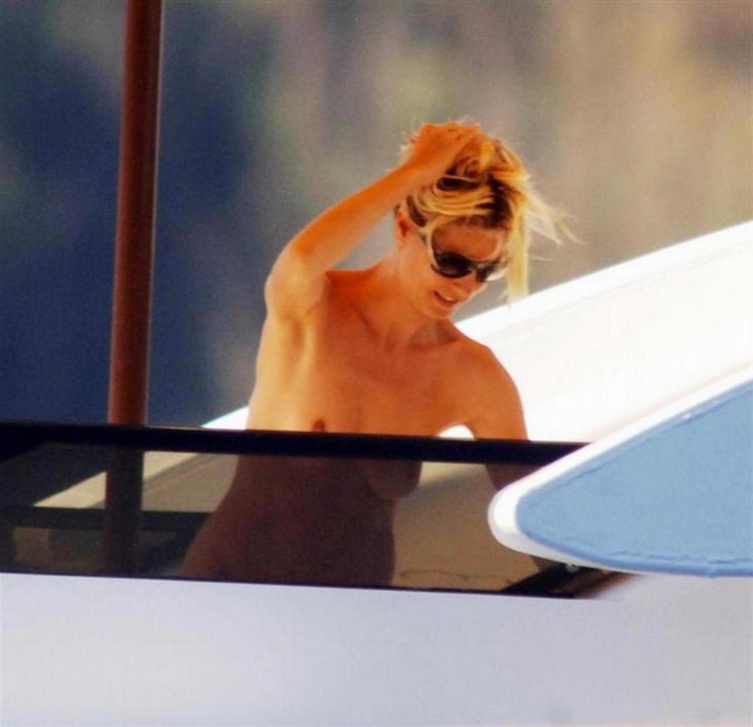 16P Heidi Klum caught sunbathing topless on vacation in Ibiza