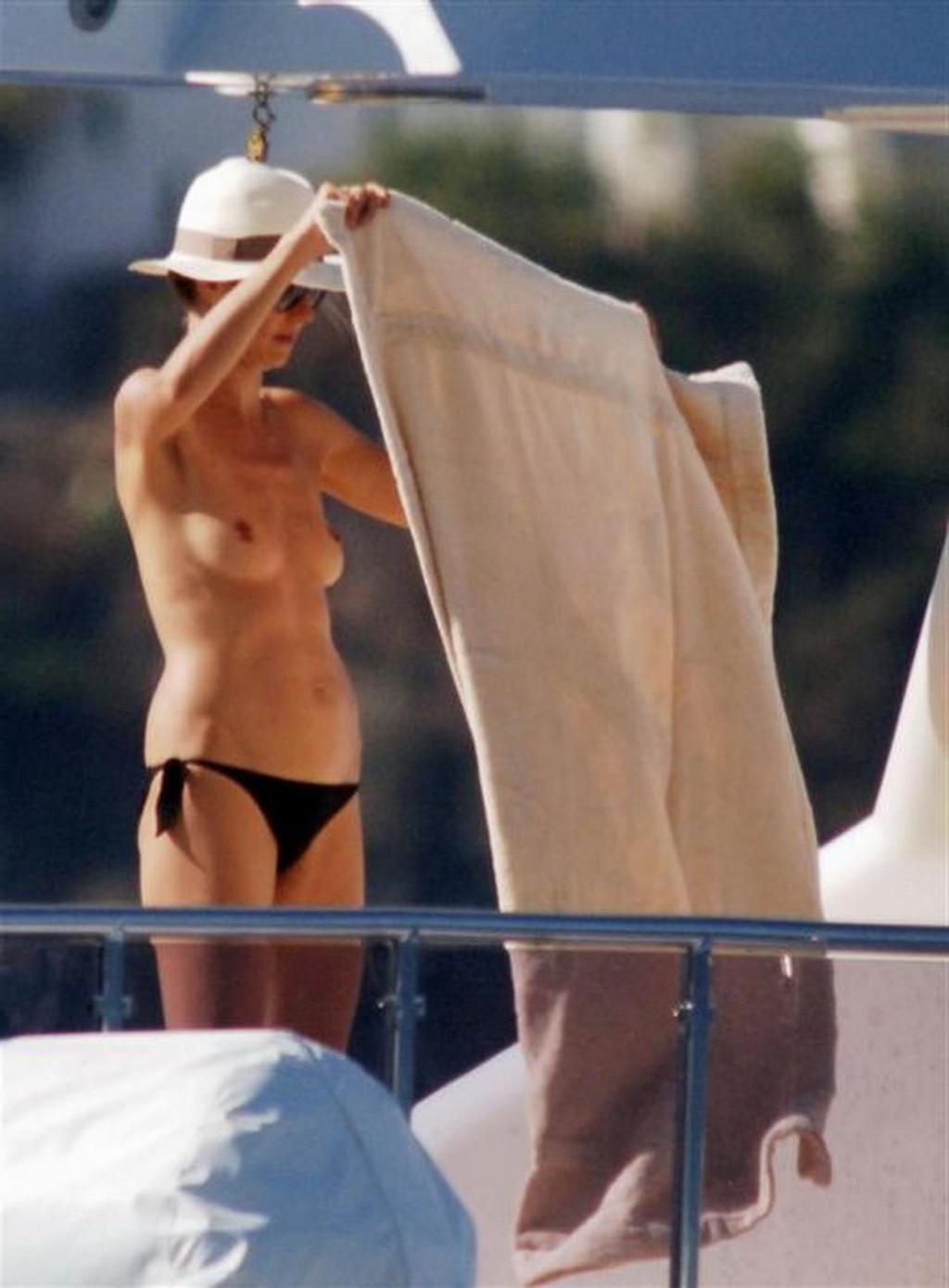 16P Heidi Klum caught sunbathing topless on vacation in Ibiza