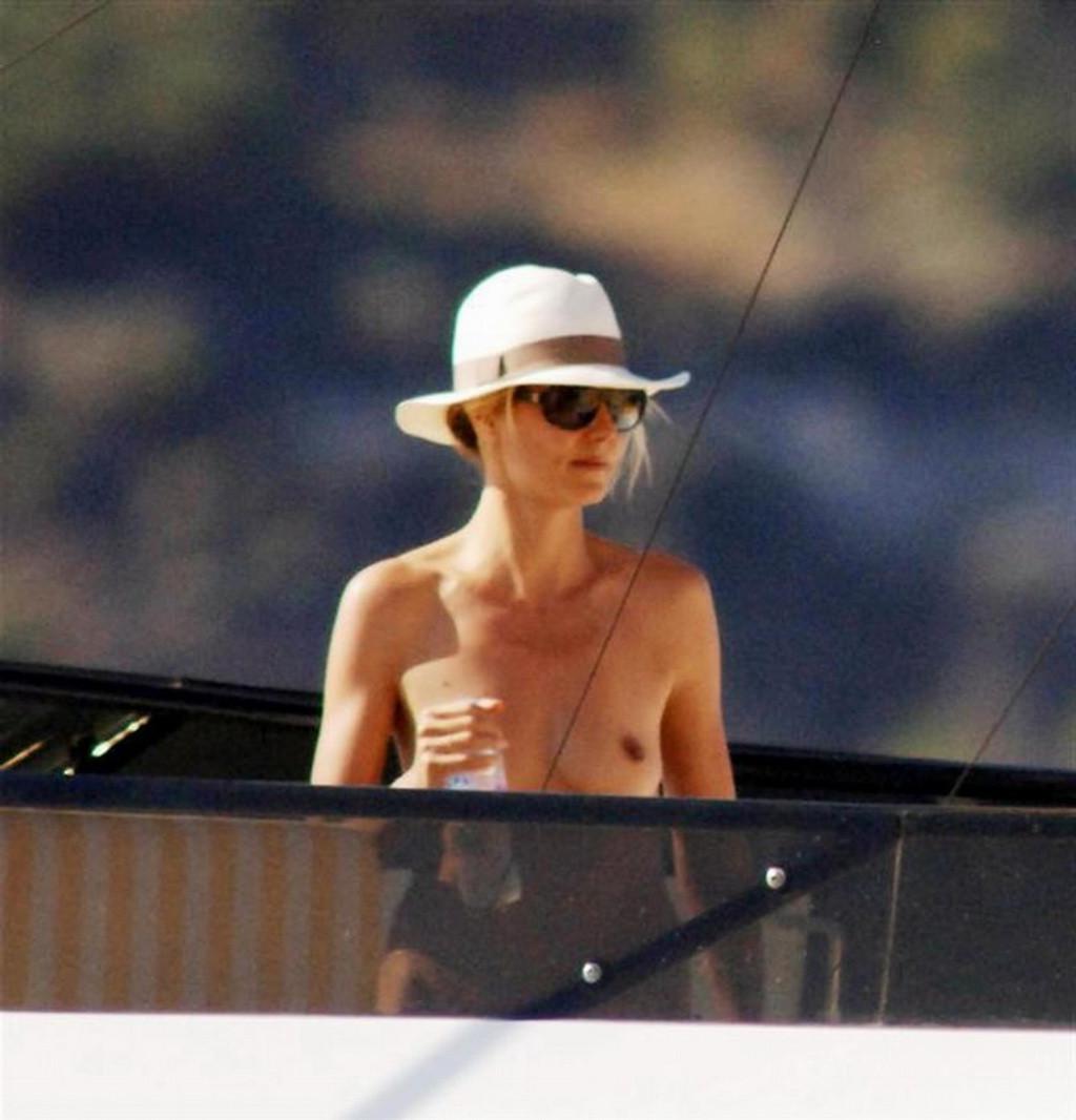 16P Heidi Klum caught sunbathing topless on vacation in Ibiza